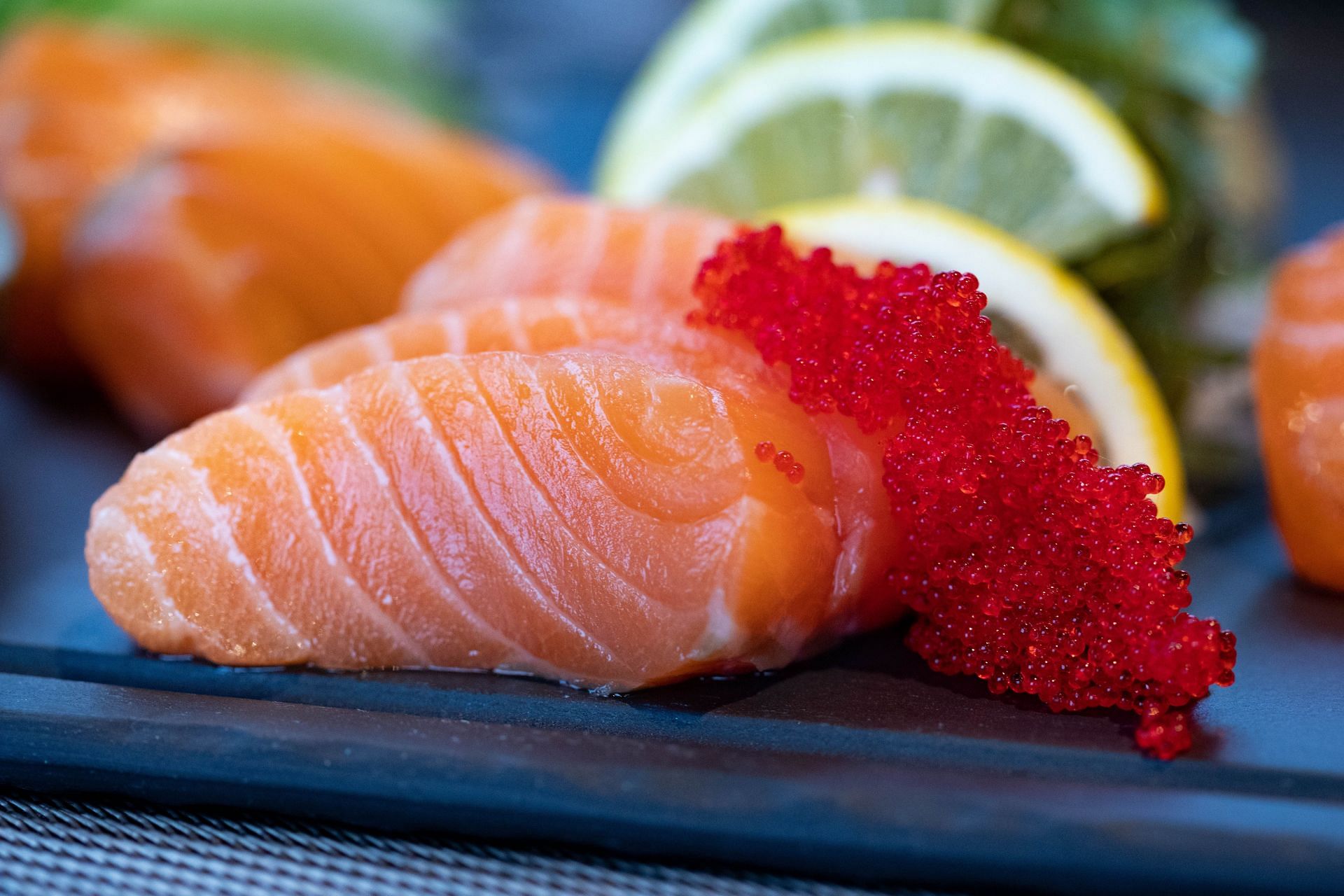 Fatty fish like salmon contain omega-3-fatty-acids that can help to lower cholesterol (Image via Pexels @Valeria Boltneva)