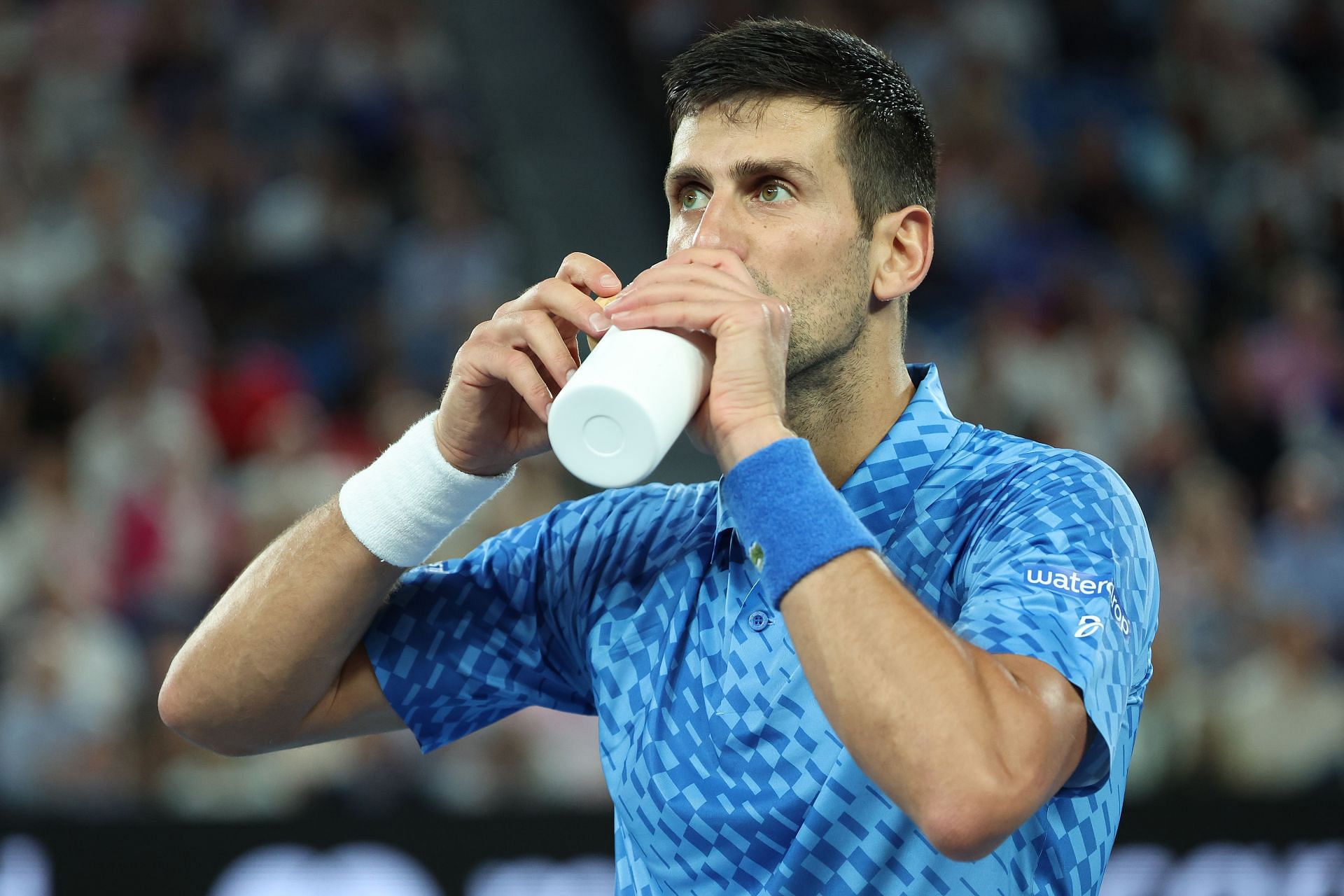 Novak Djokovic cools down between games in the Men&rsquo;s Singles Final against Stefanos Tsitsipas