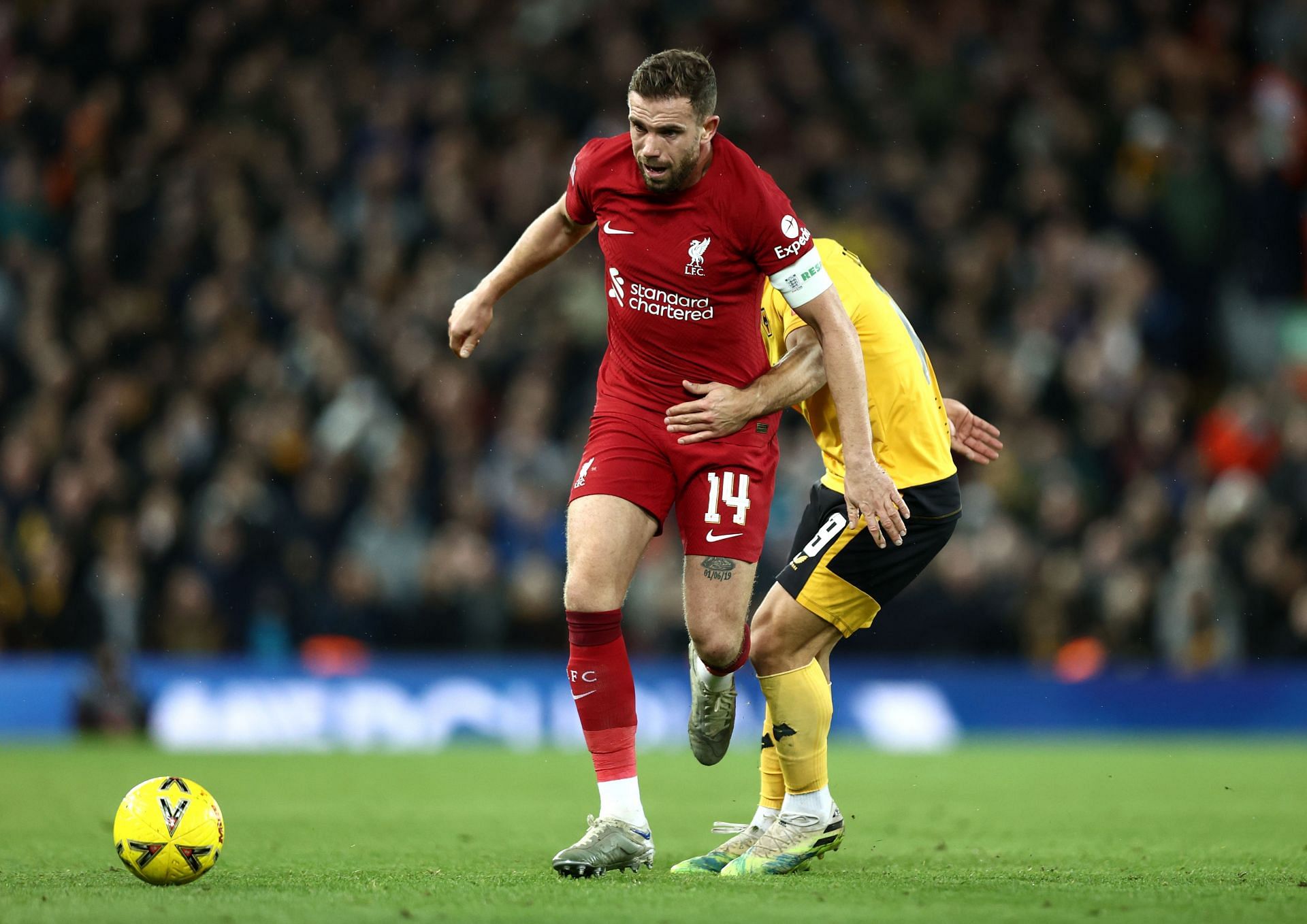Jordan Henderson in action against Wolverhampton Wanderers: Emirates FA Cup Third Round