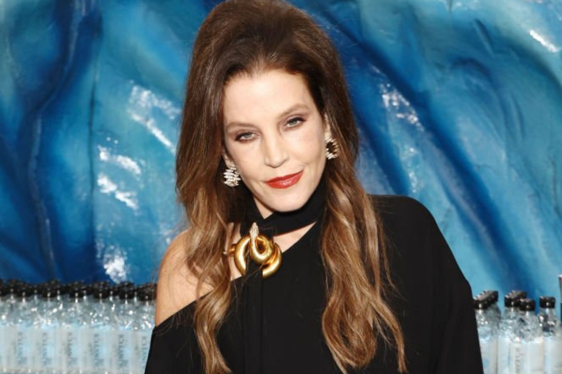 Lisa Marie Presley buried at Graceland alongside father Elvis and son Benjamin (Image via Joe Scarnici/Getty Images)