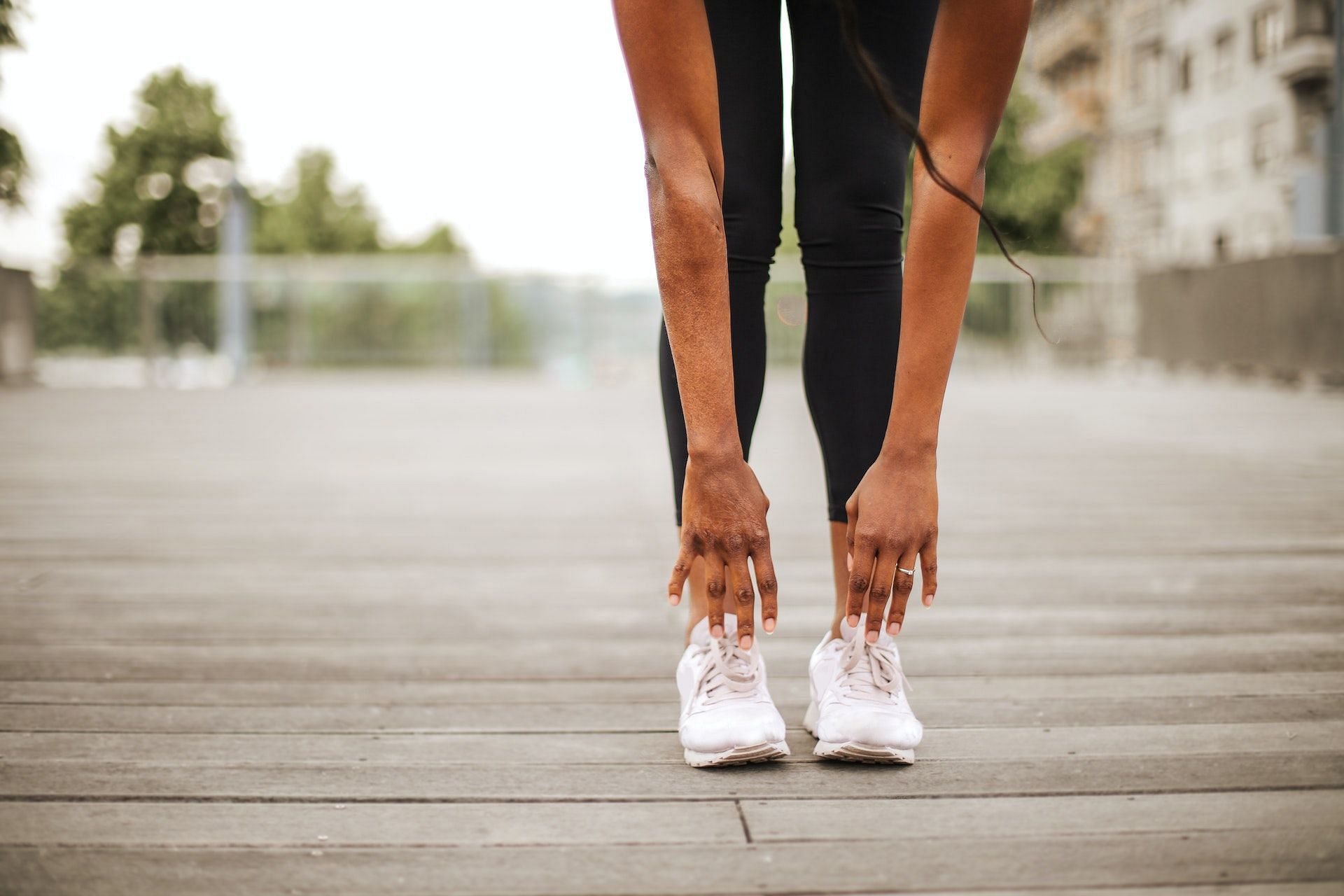 Hamstring stretches are good for knee pain. (Photo via Pexels/Andrea Piacquadio)