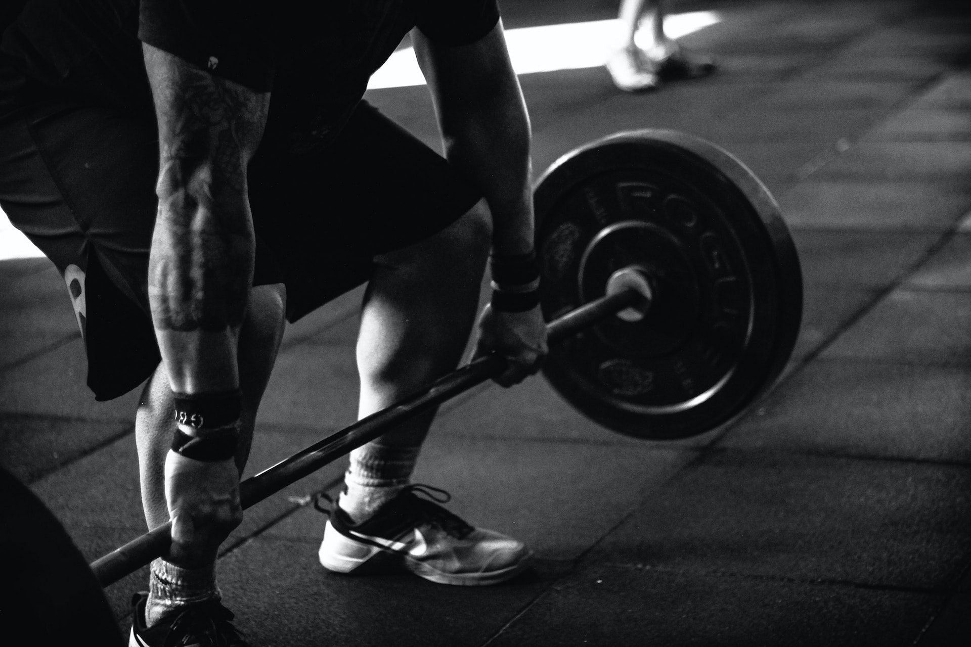 Barbell deadlift is a full-body compound exercise. (Photo via Pexels/Victor Freitas)