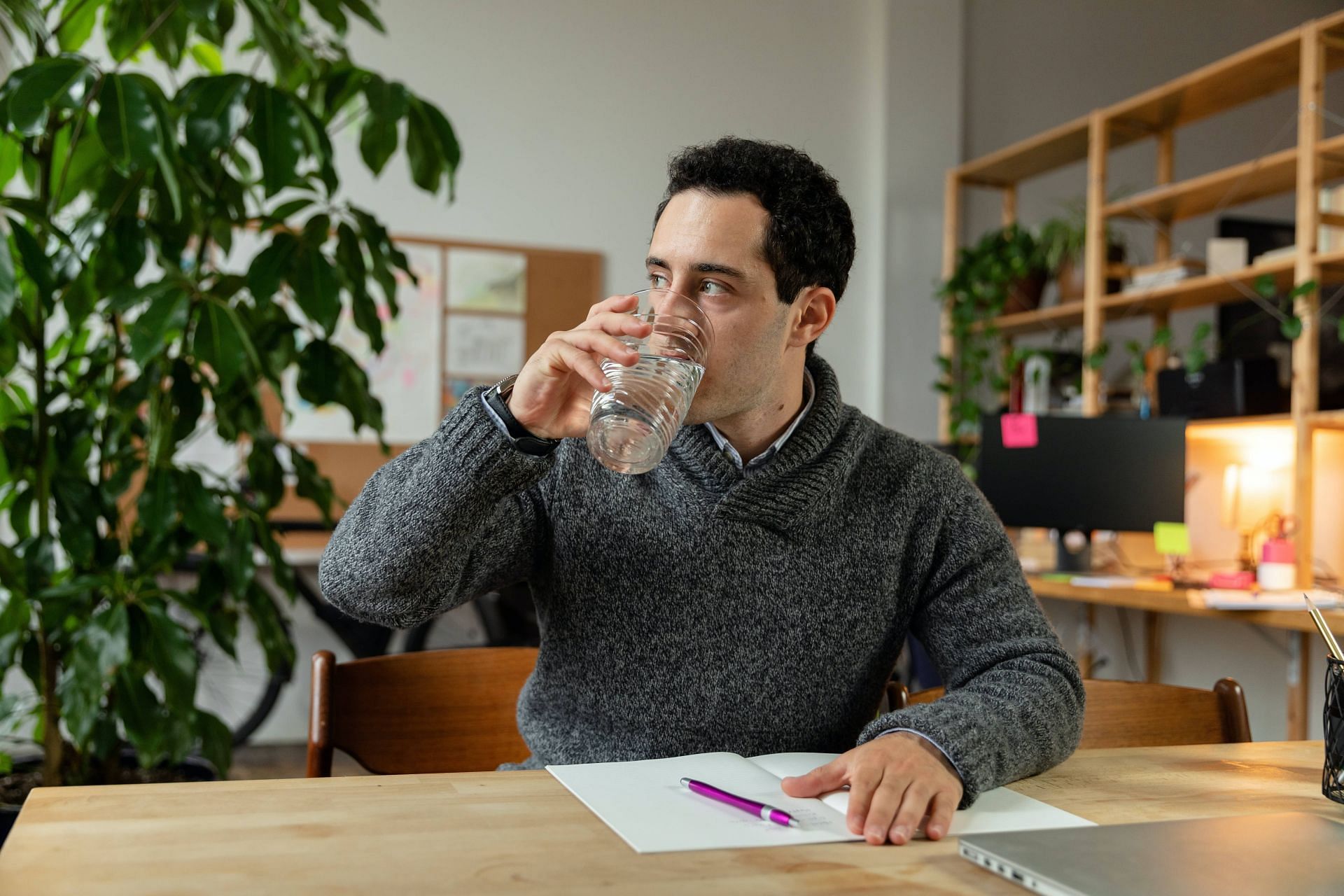 Drinking a glass of water can help relieve hiccups (Image via Pexels @Rodnae Productions)