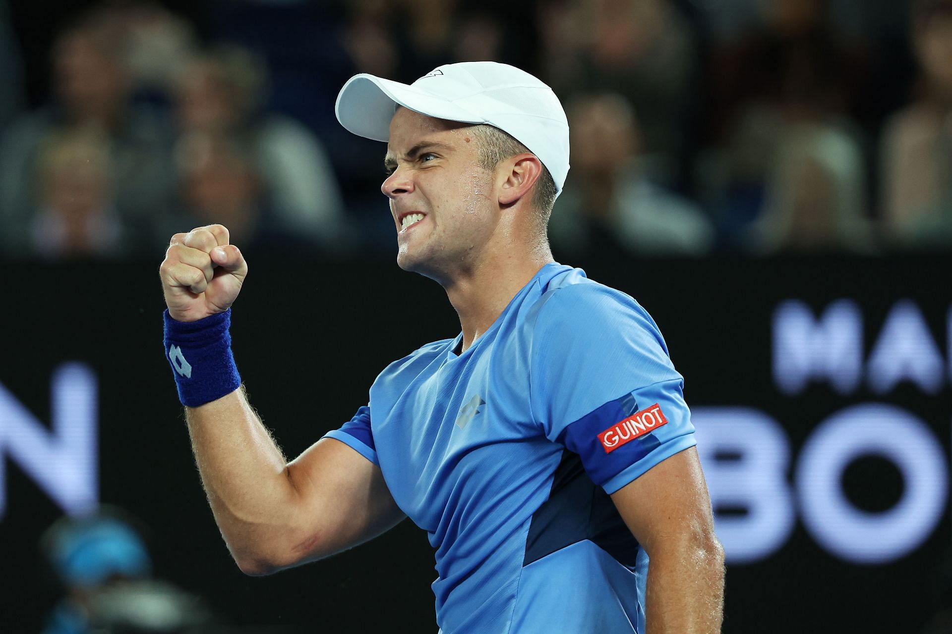 Enzo Couacaud celebrates a point against Novak Djokovic at the 2023 Australian Open