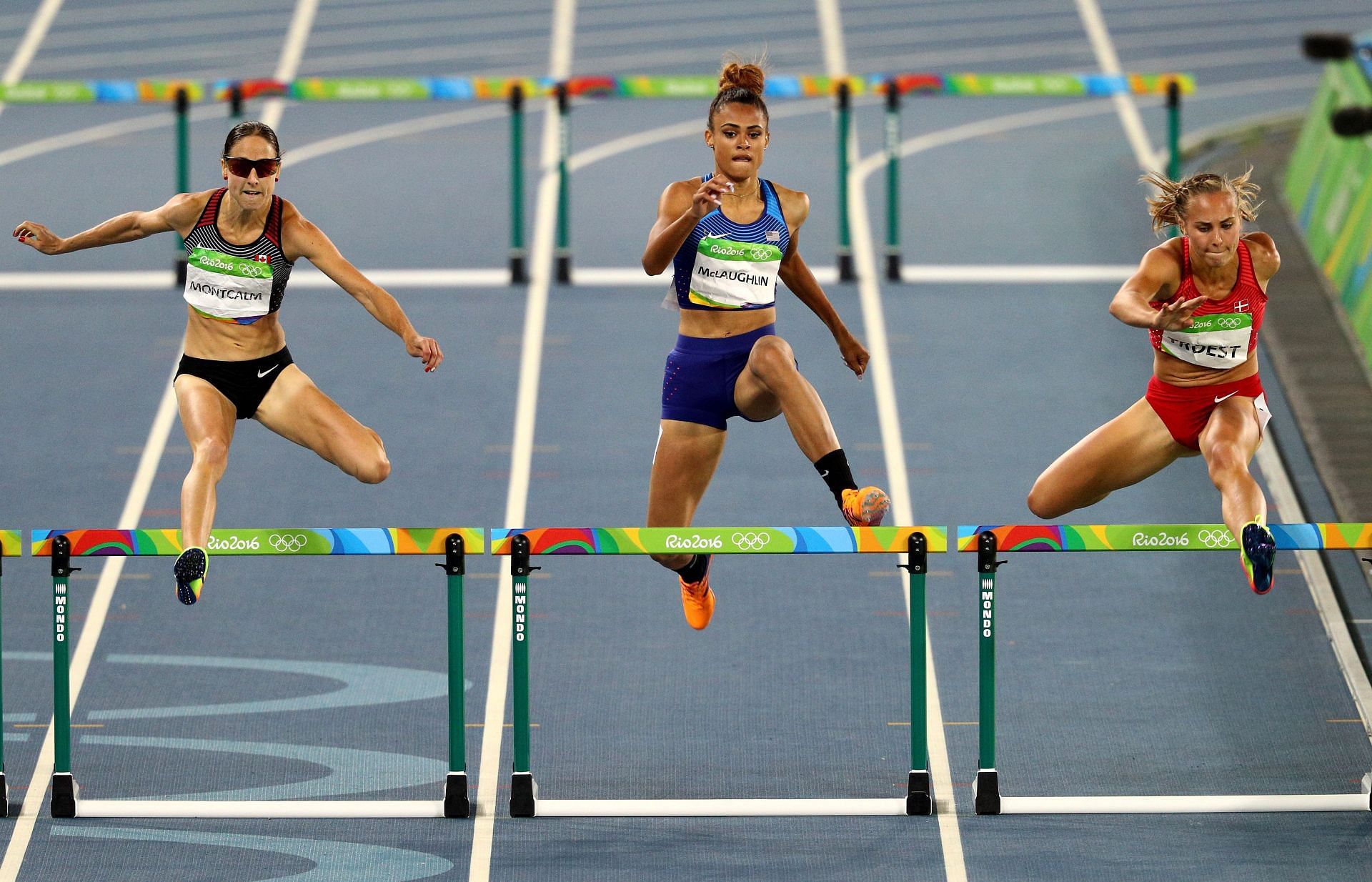 Sydney McLaughlin of the United States and Stina Troest of Denmark compete during the Women&#039;s 400m Hurdles Semifinals on Day 11 of the Rio 2016 Olympic Games at the Olympic Stadium on August 16, 2016 in Rio de Janeiro, Brazil. (Photo by Paul Gilham/Getty Images)