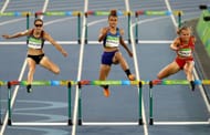 Sydney McLaughlin of the United States and Stina Troest of Denmark compete during the Women's 400m Hurdles Semifinals on Day 11 of the Rio 2016 Olympic Games at the Olympic Stadium on August 16, 2016 in Rio de Janeiro, Brazil. (Photo by Paul Gilham/Getty Images)