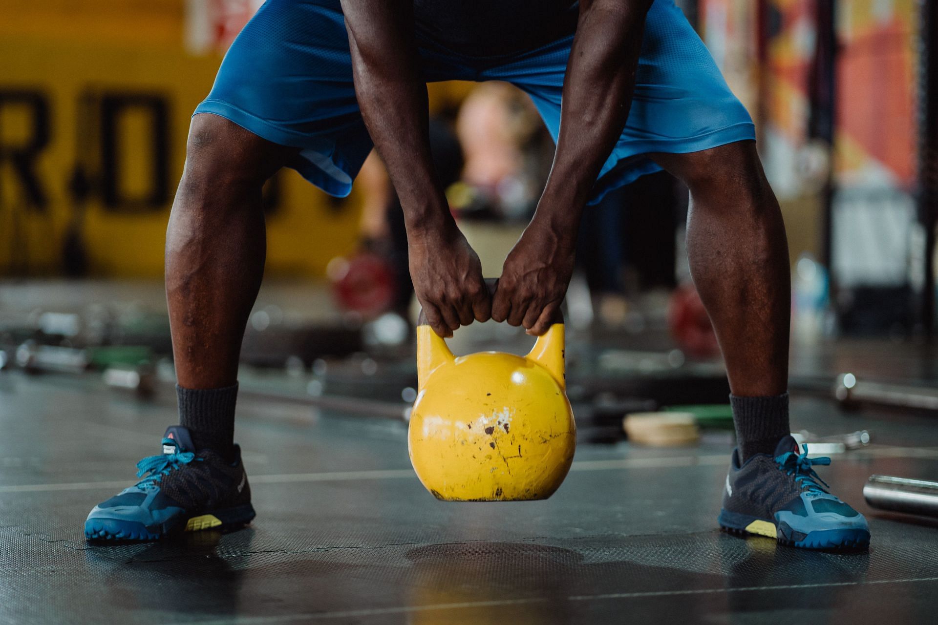 Kettlebell deadlifts are a great exercise for your back, glutes, and core! (Image via pexels/Ketut Subiyanto)