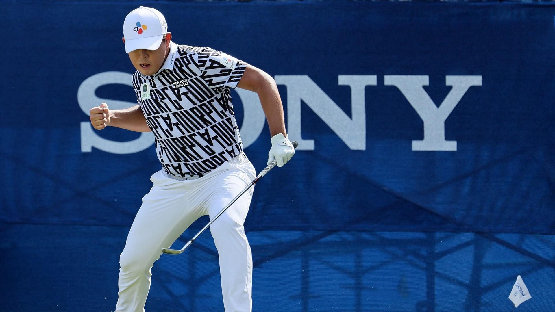 Si Woo Kim fist pumping after securing win in Sony Open