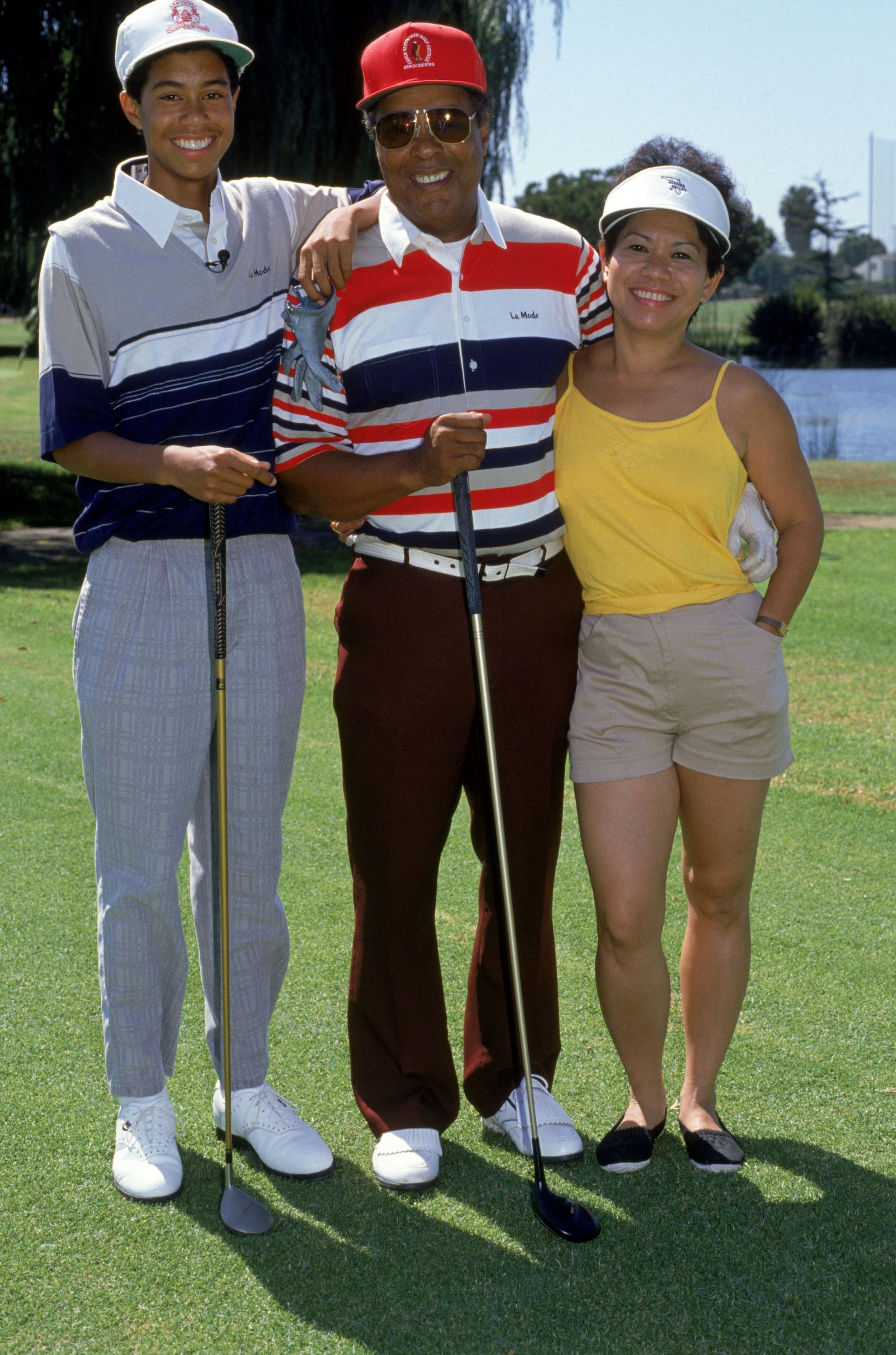 Tiger Woods with parents Earl and Kutilda Woods (Image via Ken Levine/Getty Images)