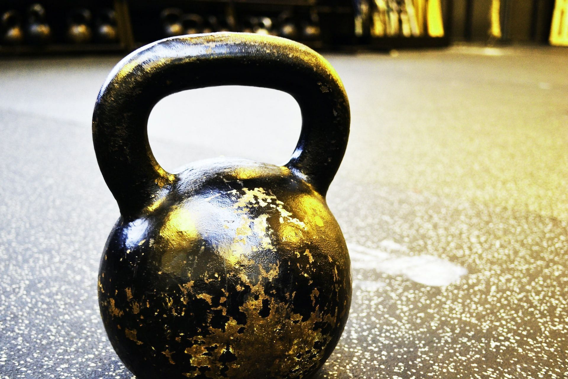 Kettlebell workouts improve muscle strength. (Photo via Unsplash/Jesper Aggergaard)