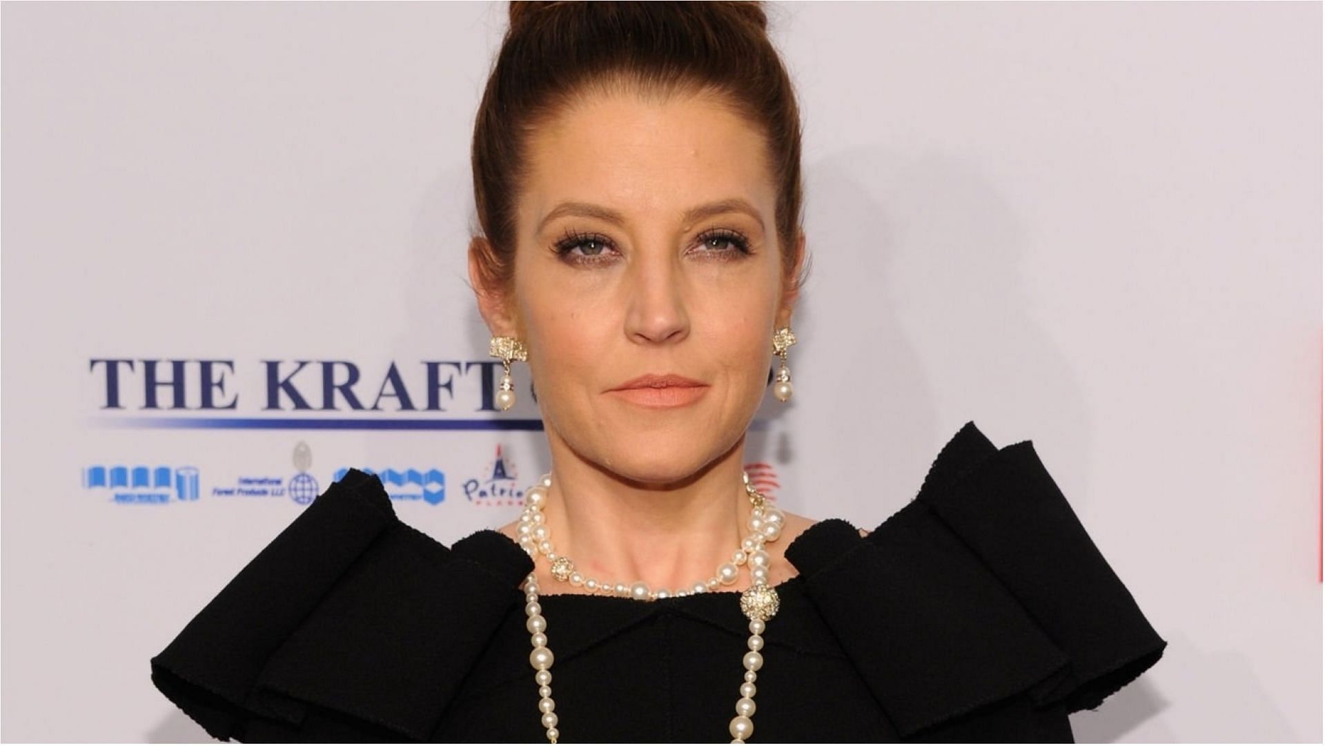 Lisa Marie Presley was in a lot of debt before her death (Image via Dimitrios Kambouris/Getty Images)