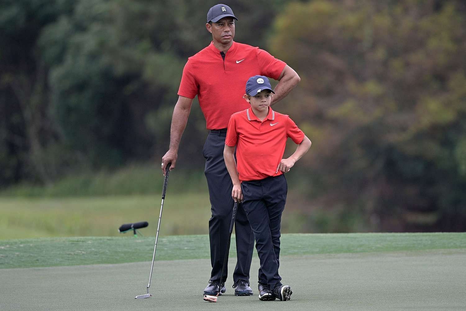 Charlie Woods and Tiger Woods (Image via People)
