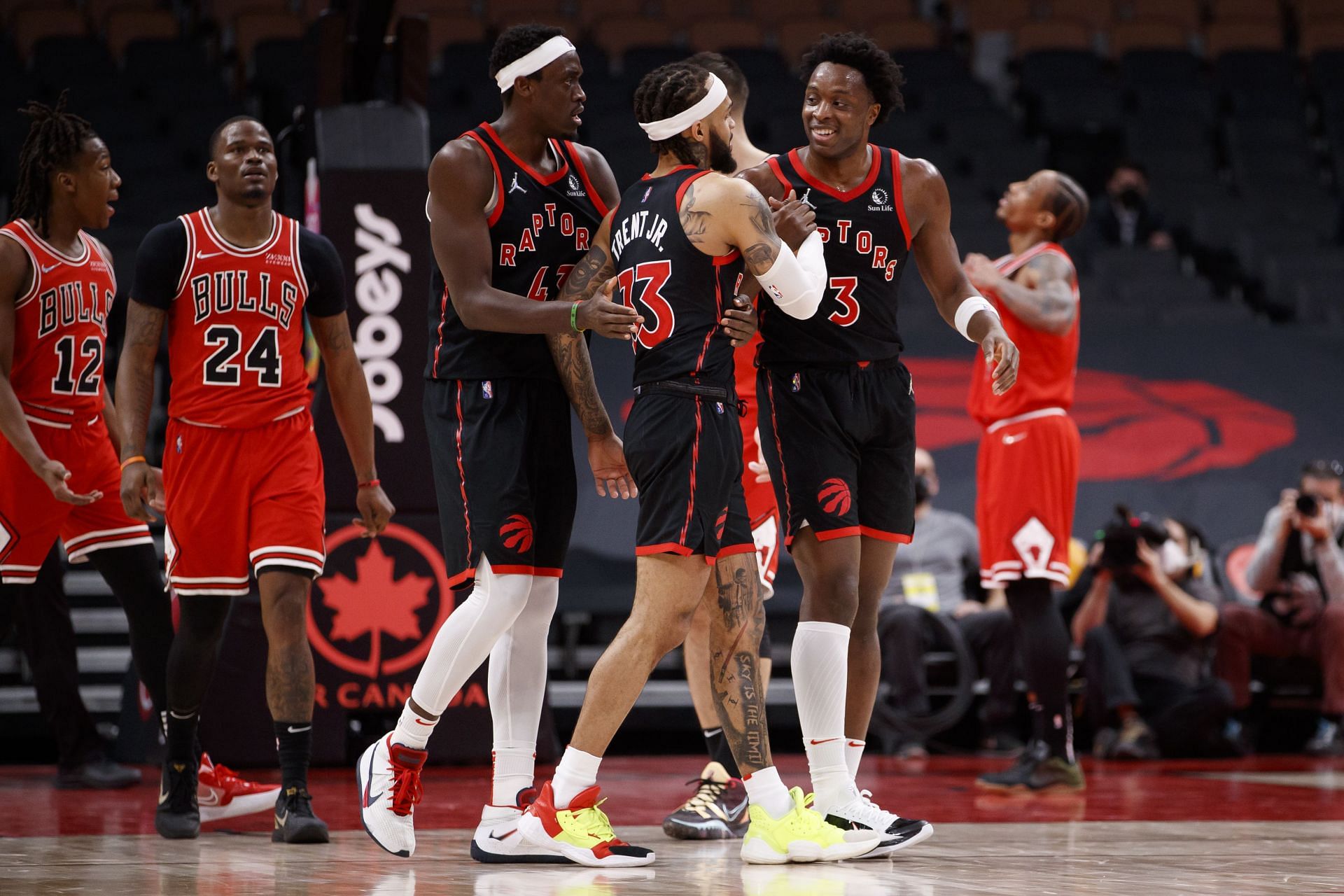 Pascal Siakam, Gary Trent Jr. and OG Anunoby of the Toronto Raptors