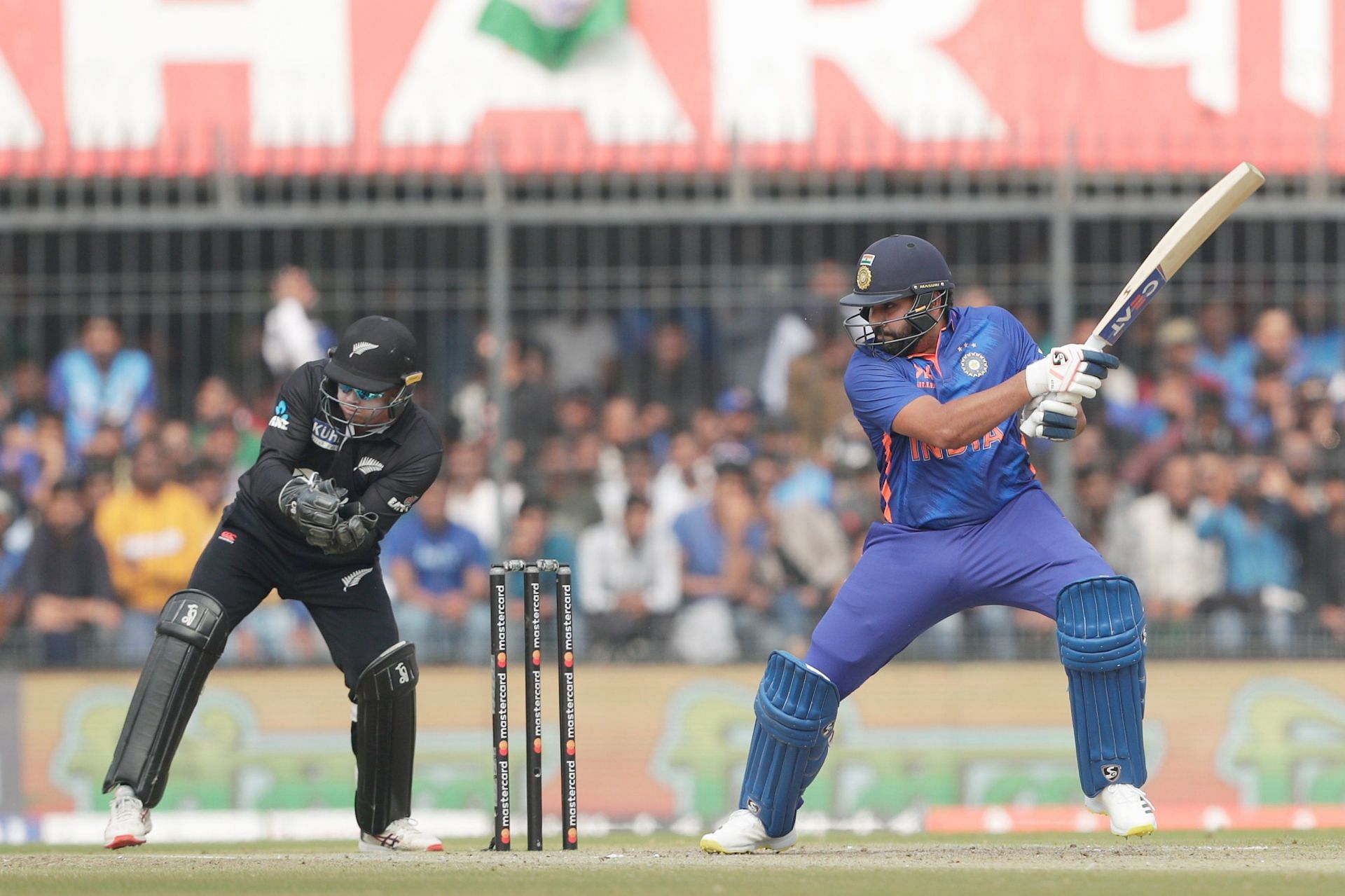 Rohit Sharma plays a shot as Tom Latham looks on. (Credits: Twitter)