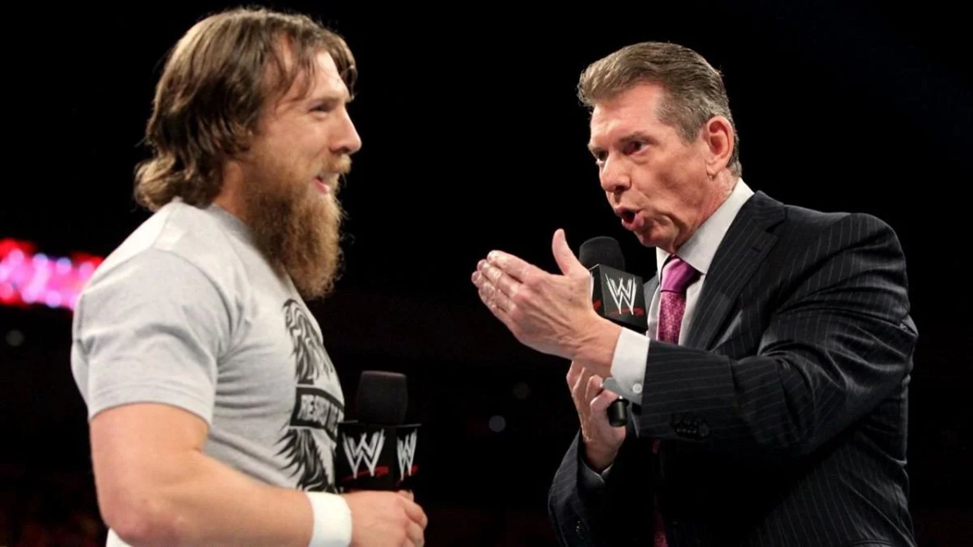 Bryan Danielson (Left) and Vince McMahon (Right) during an on-screen feud in WWE.