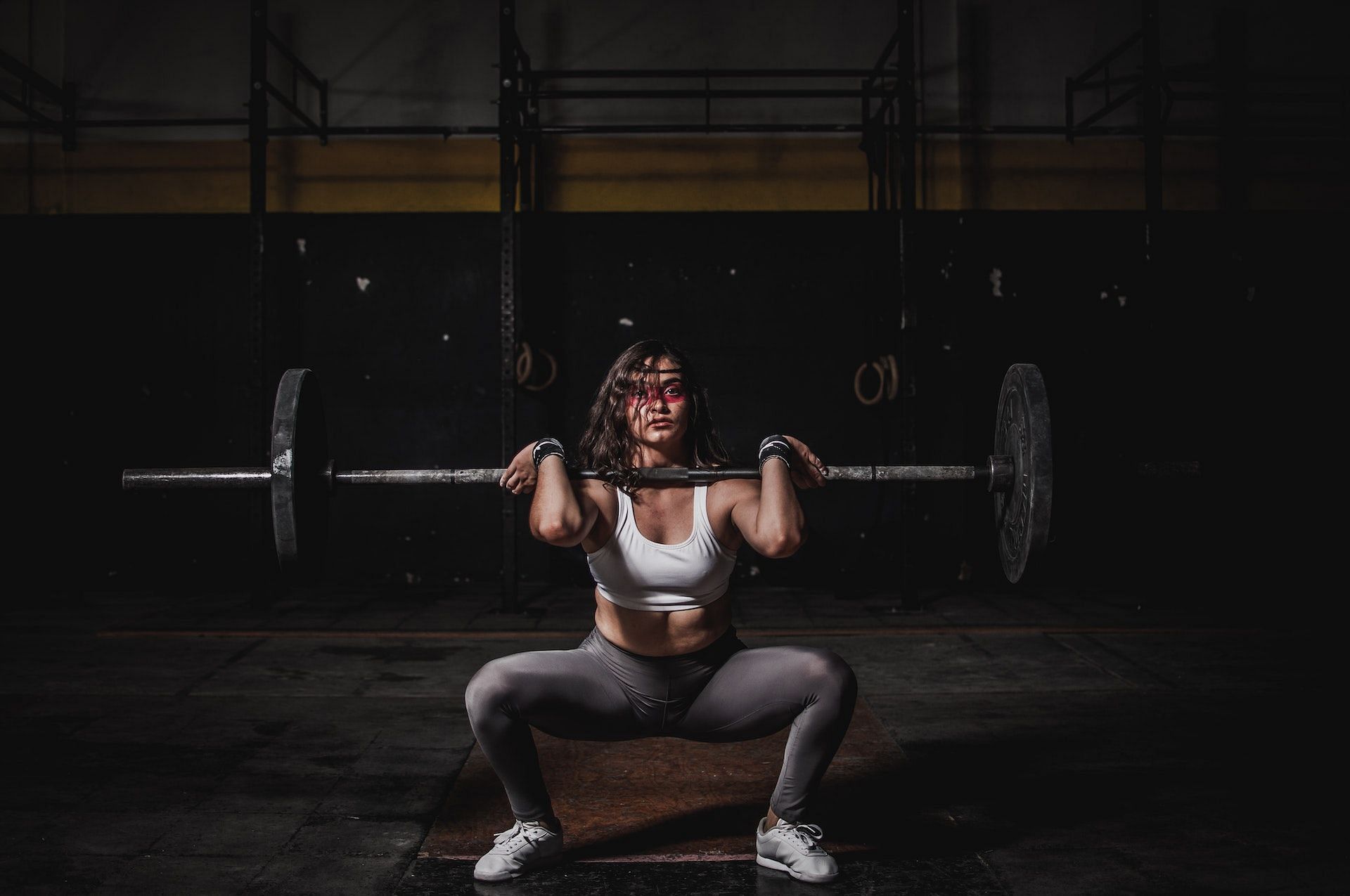 Barbell overhead press is a great shoulder exercise. (Photo via Pexels/Leon Ardho)