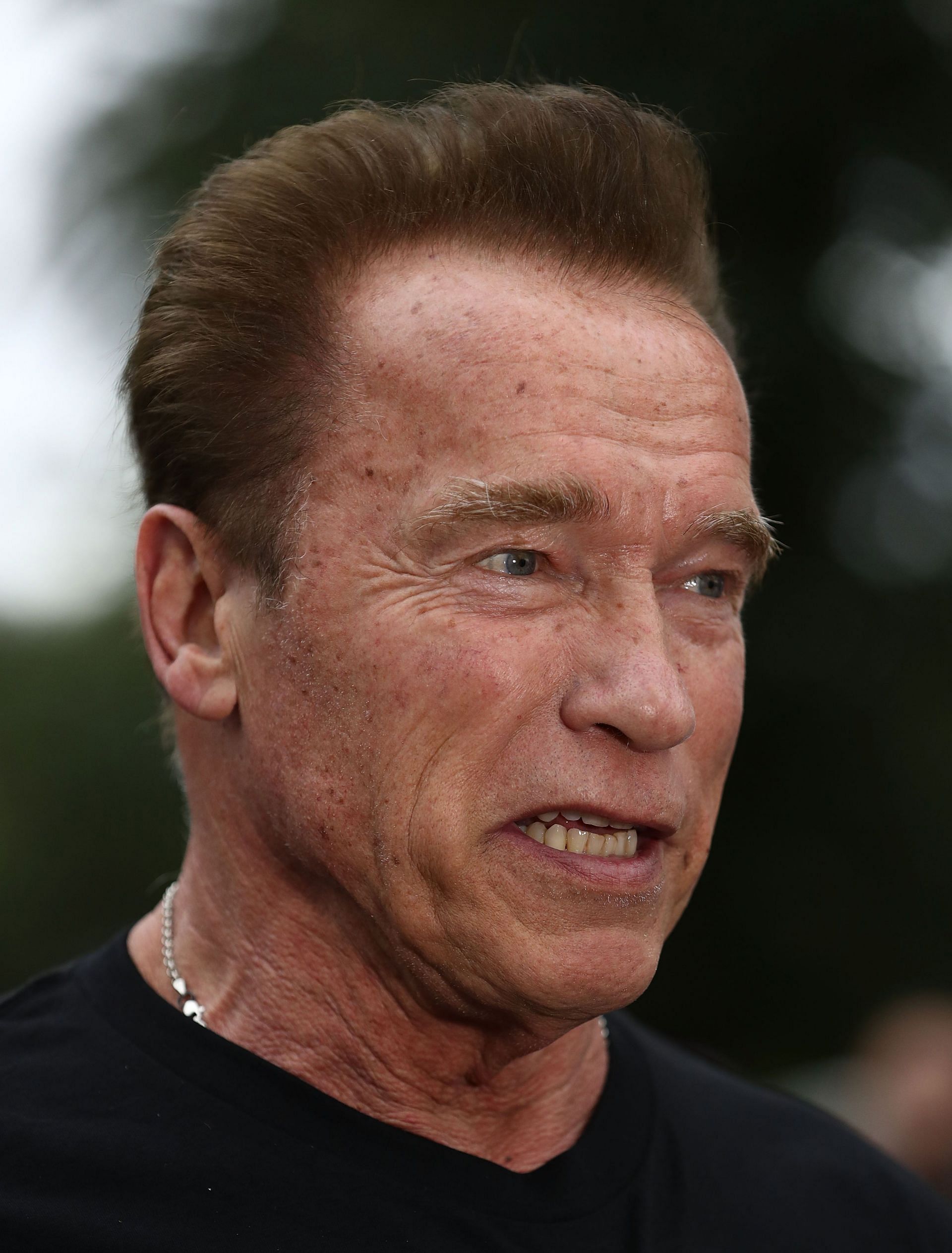 Arnold Schwarzenegger speaks to the media as he prepares to start the Run for the Kids charity run as part of the Arnold Sports Festival Australia in 2018