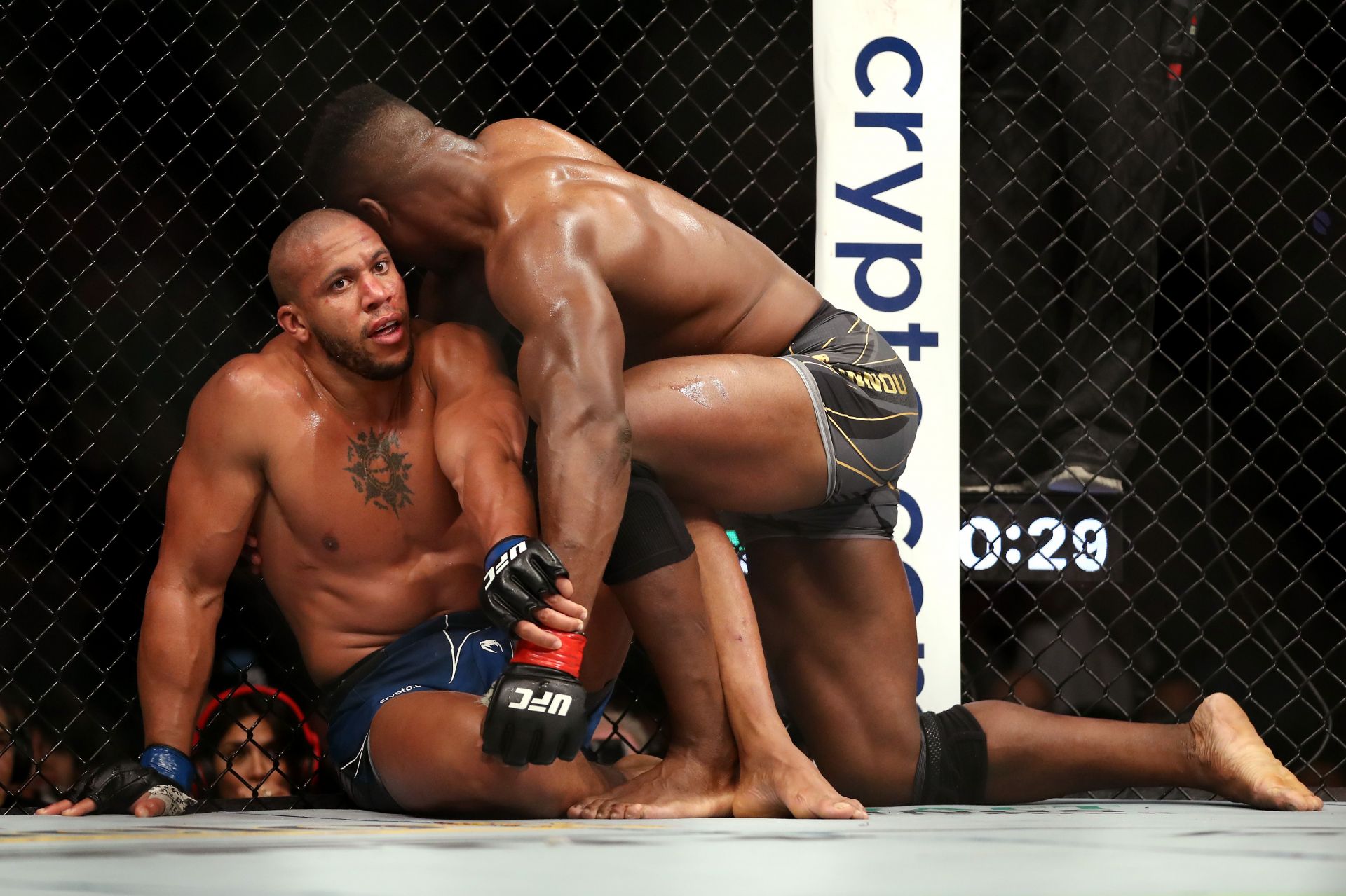 Ciryl Gane (left) in his title fight against Francis Ngannou