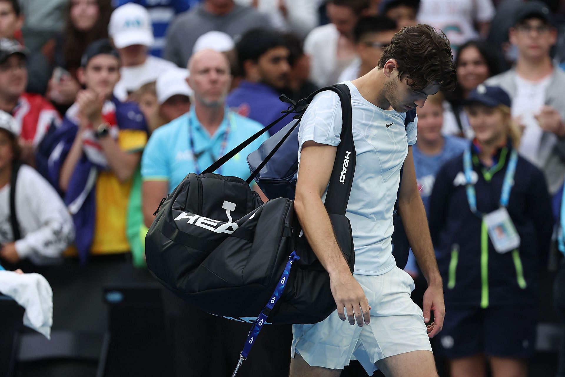 Dejected Taylor Fritz exits the John Cain Arena after loss to Aussie