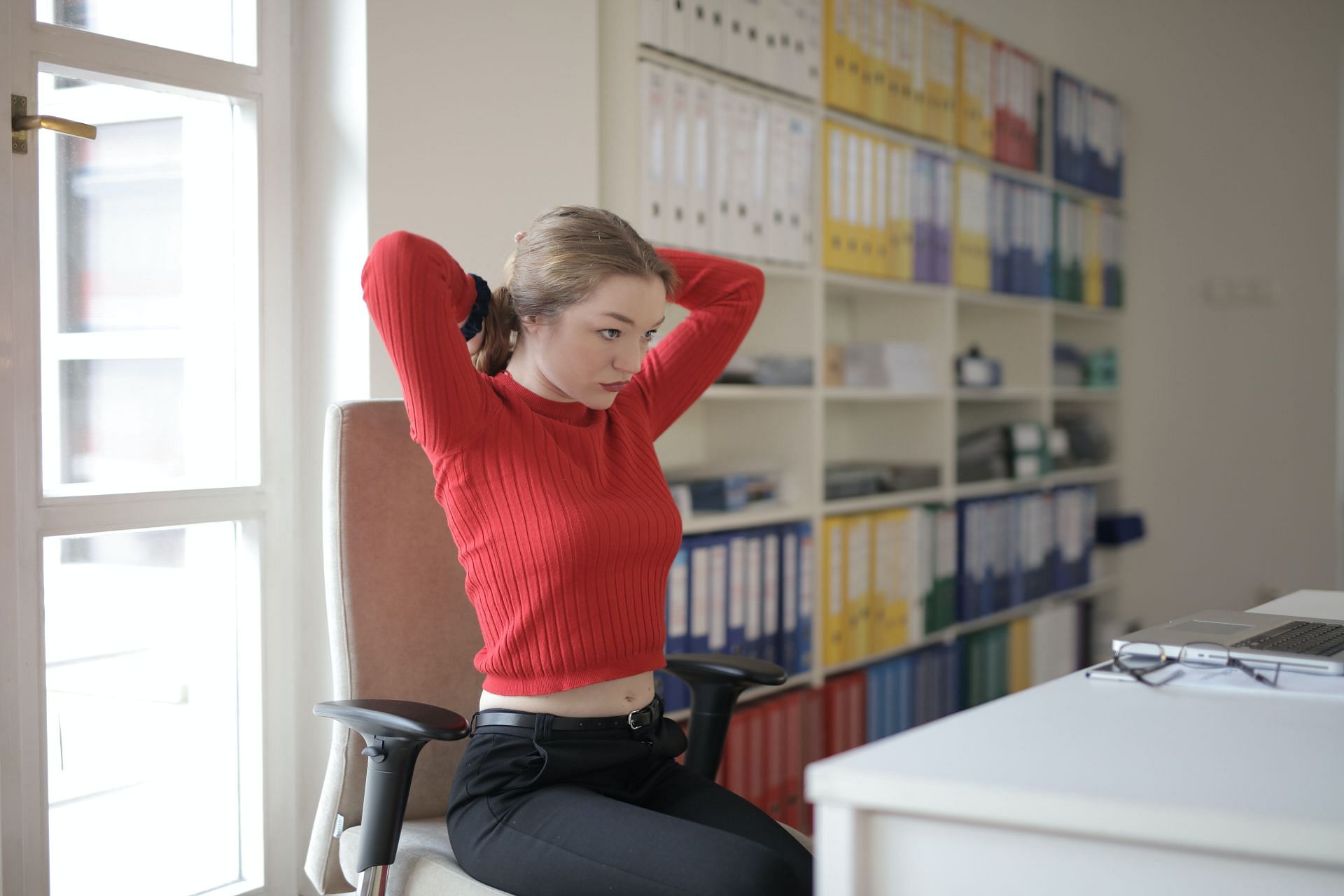 Doing some sort of exercise in the workplace is a great way to boost your mood (Image via Pexels @Andrea Piacquadio)