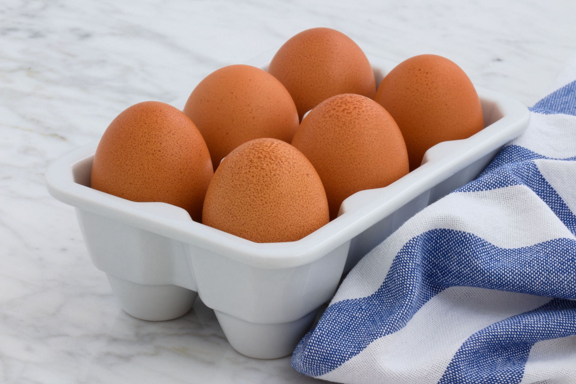 Eggs are a good source of protein. (Image via Unsplash / Estudio Gourmet)