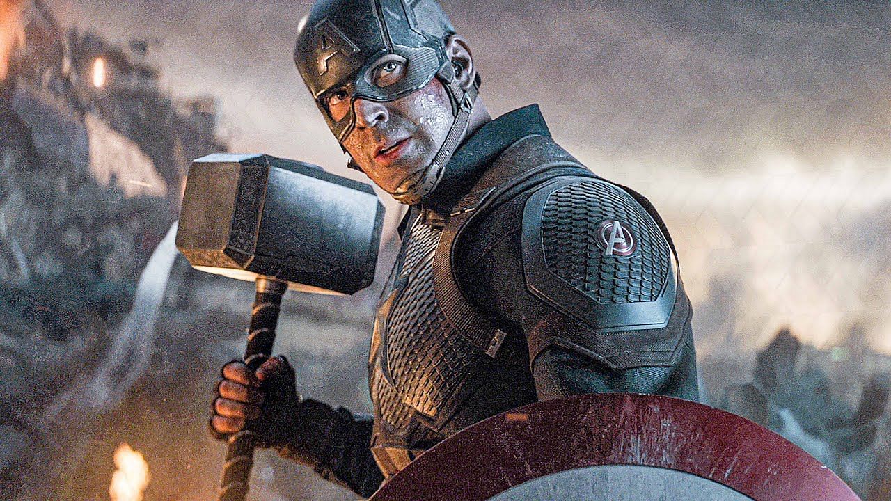 Captain America proves his worthiness by lifting Thor's hammer (Image via Marvel Studios)