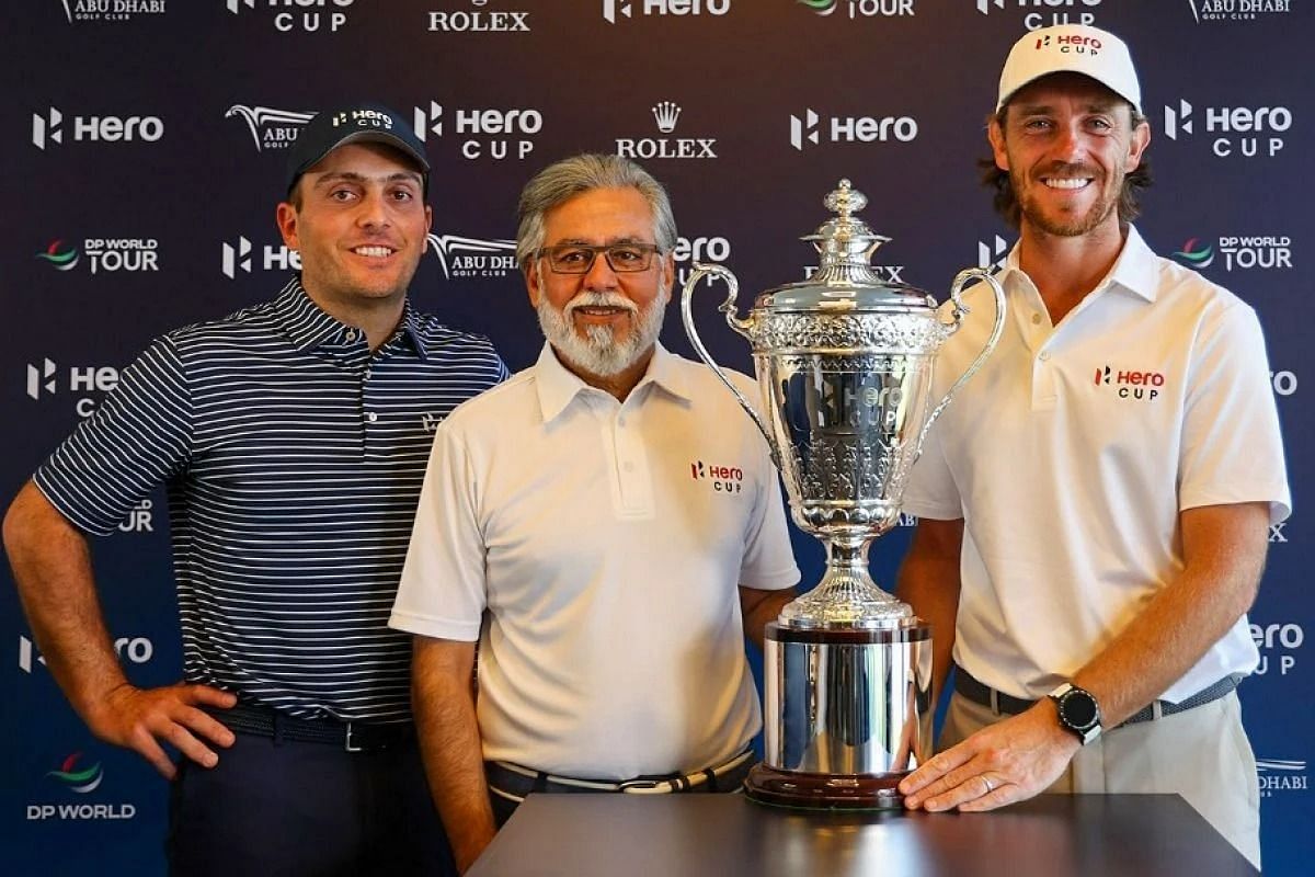 Francesco Molinari and Tommy Fleetwood pose with Hero Cup Trophy before the start of the event