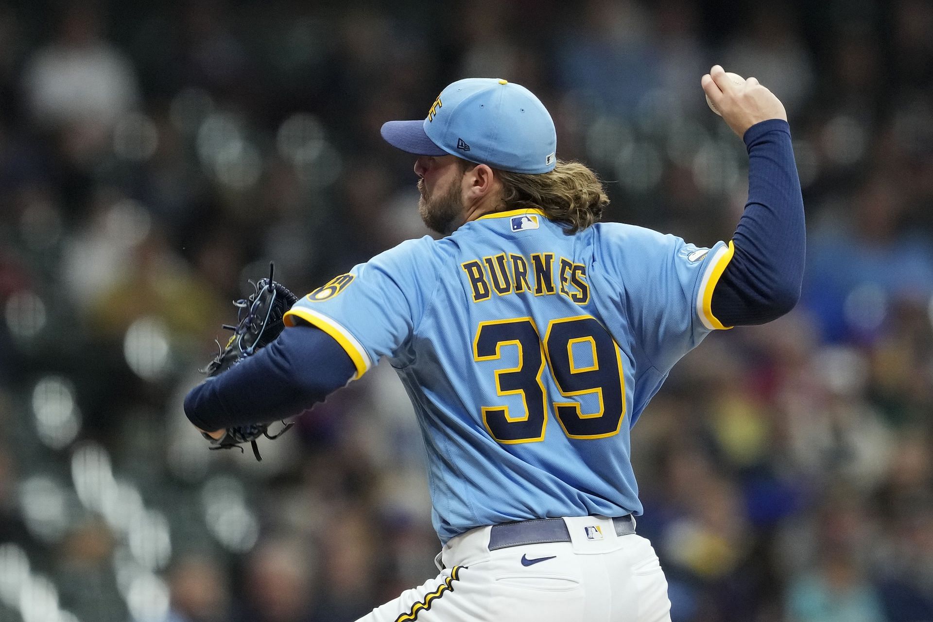 Arrieta battered by Brewers while Burnes dominates