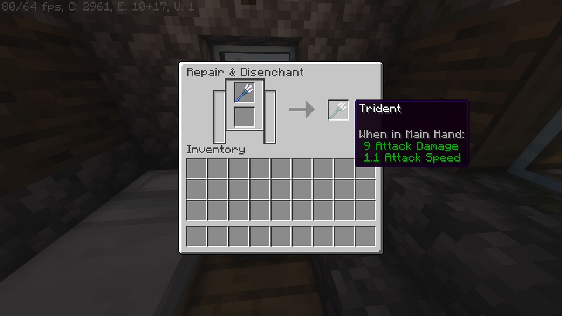 Disenchanting a trident on a grindstone in Minecraft (Image via Mojang)