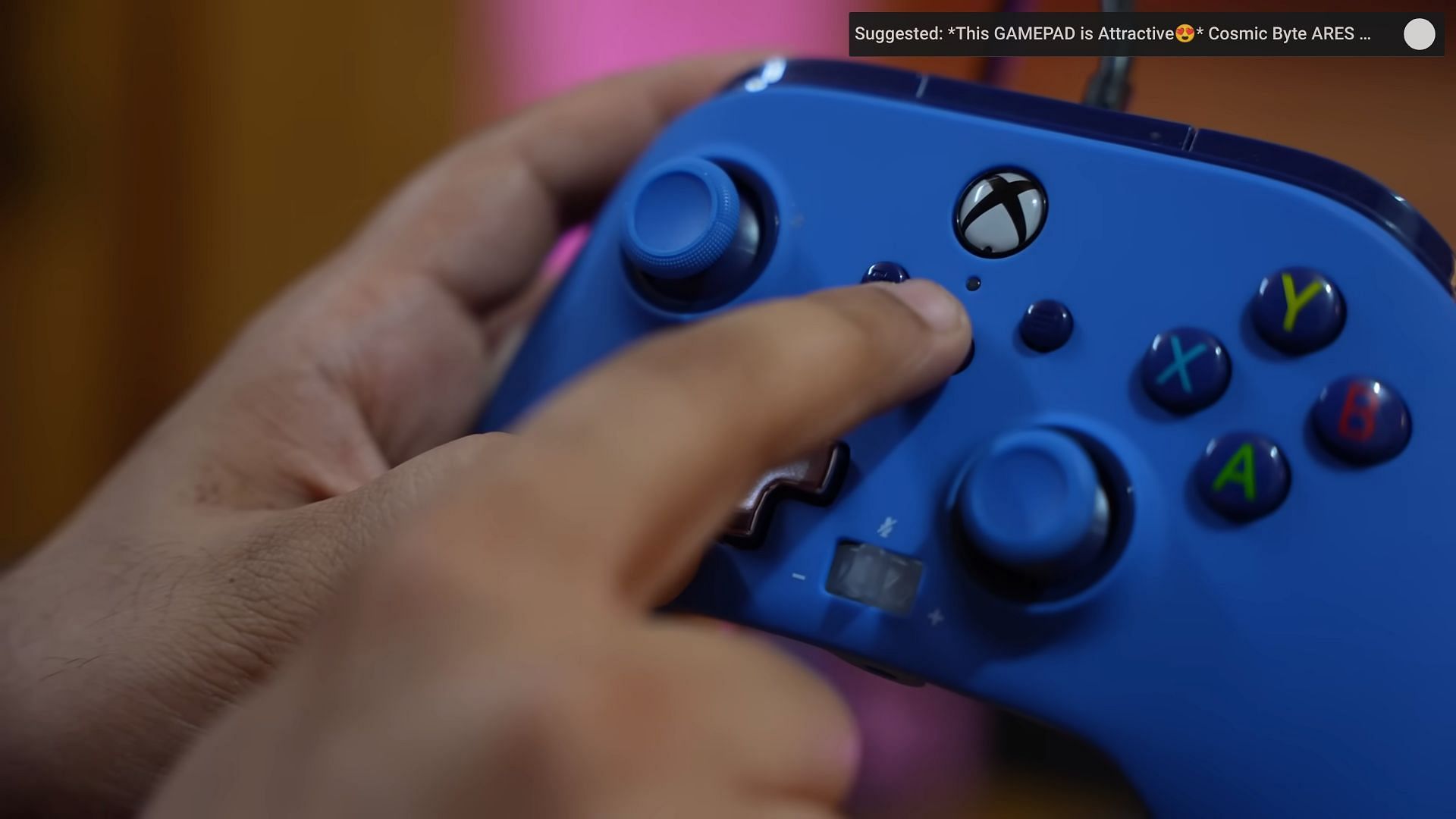Turning on the controller (Image by Sportskeeda)