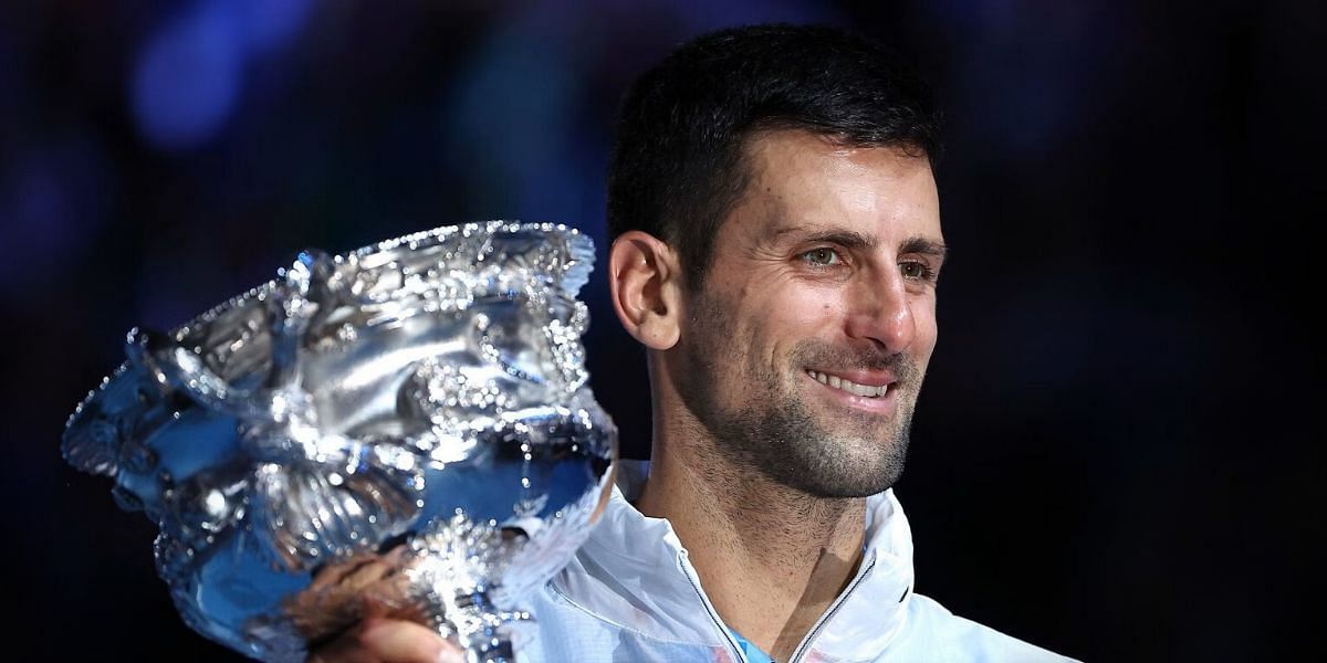 Novak Djokovic celebrates winning the 2023 Australian Open title.