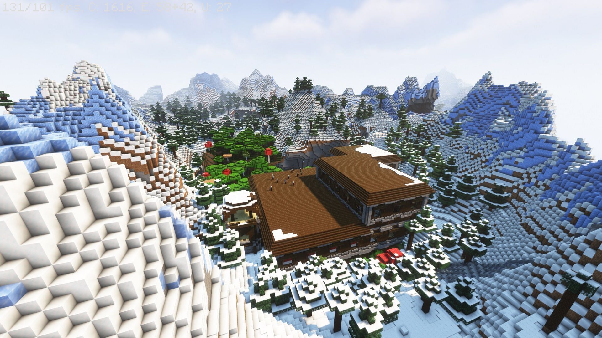 The pillager outpost looks tiny next to the mansion (Image via Mojang)