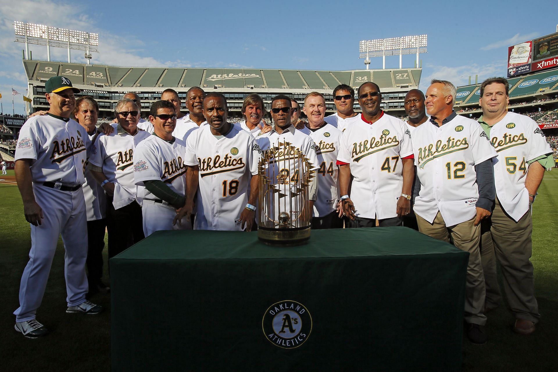 OAKLAND, CA - JULY 19: Members of the 1989 Oakland Athletics celebrate their World Series championship 25 years ago before a game against the Baltimore Orioles at O.co Coliseum on July 19, 2014, in Oakland, California. (Photo by Brian Bahr/Getty Images)