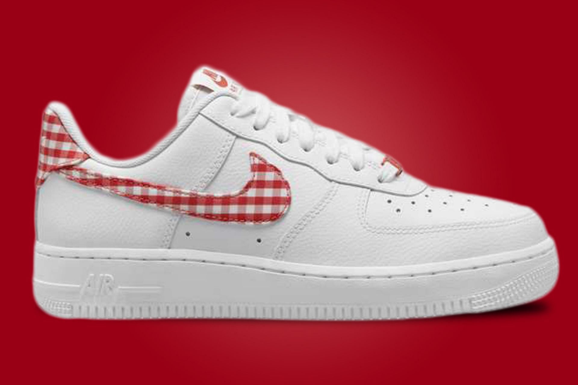 These sneakers are adorned with checkered swooshes (Image via Nike)