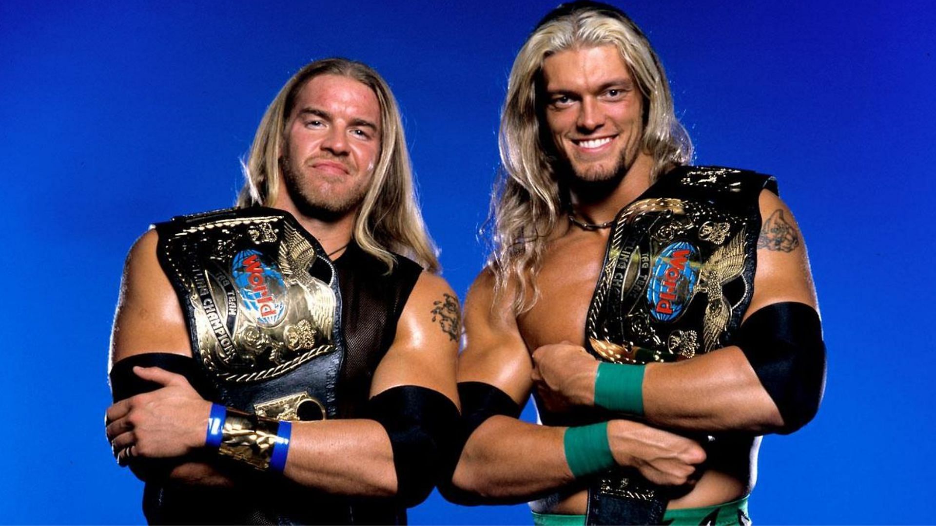 Christian (Left) and Edge (Right) with the WWF World Tag Team Championships.