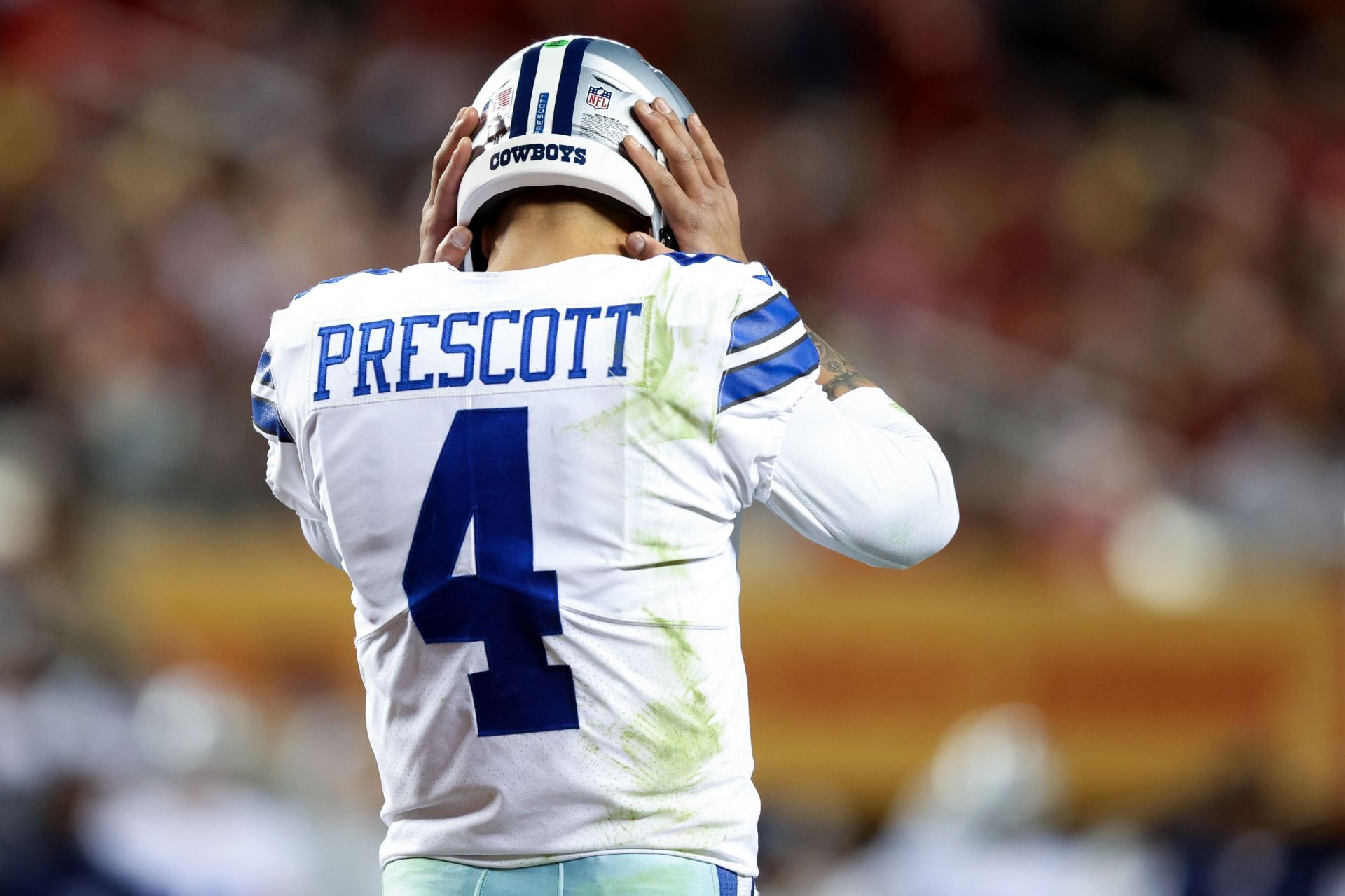 Dallas Cowboys quarterback Dak Prescott wears Nike shoes as he speaks  during a press conference following an NFL football game against the  Arizona Cardinals in Arlington, Texas, Sunday, Jan. 2, 2022. (AP