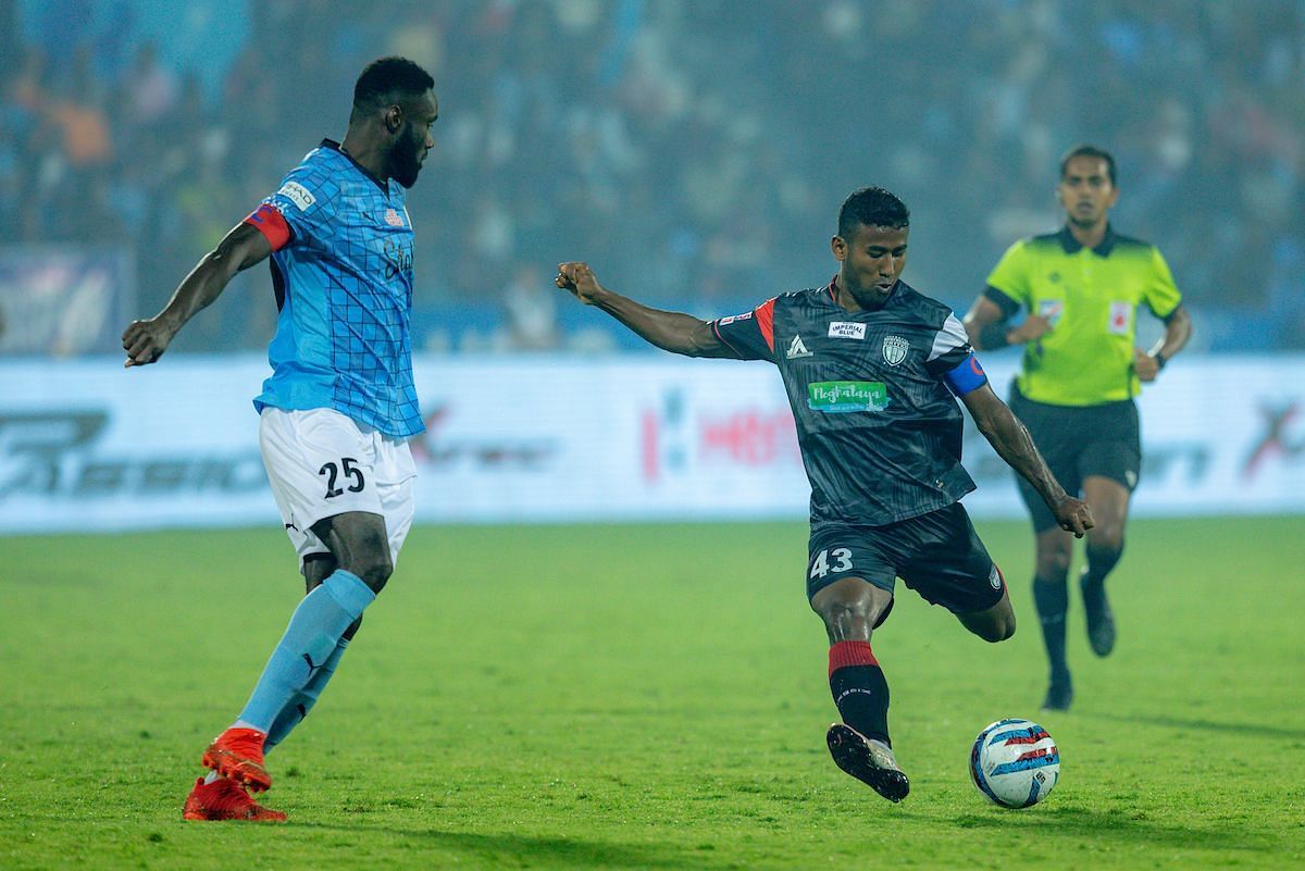 Parthib Gogoi (right) in action for NorthEast United FC against Mumbai City FC. [Credits: ISL Media]