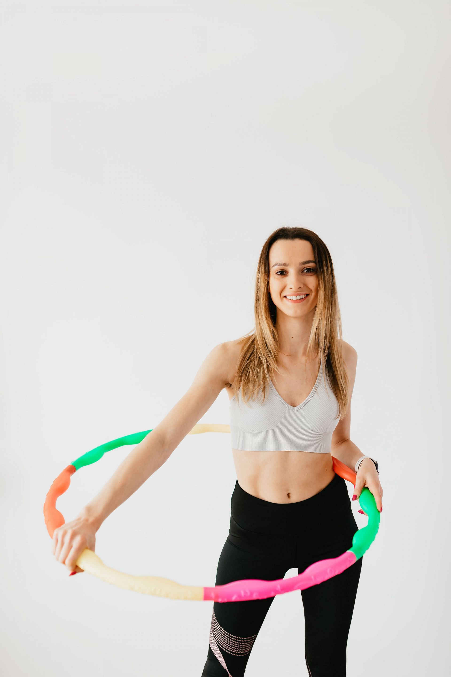 Hula hoop exercises burn a lot of calories. (Image via Pexels/ Karolina Grabowska)