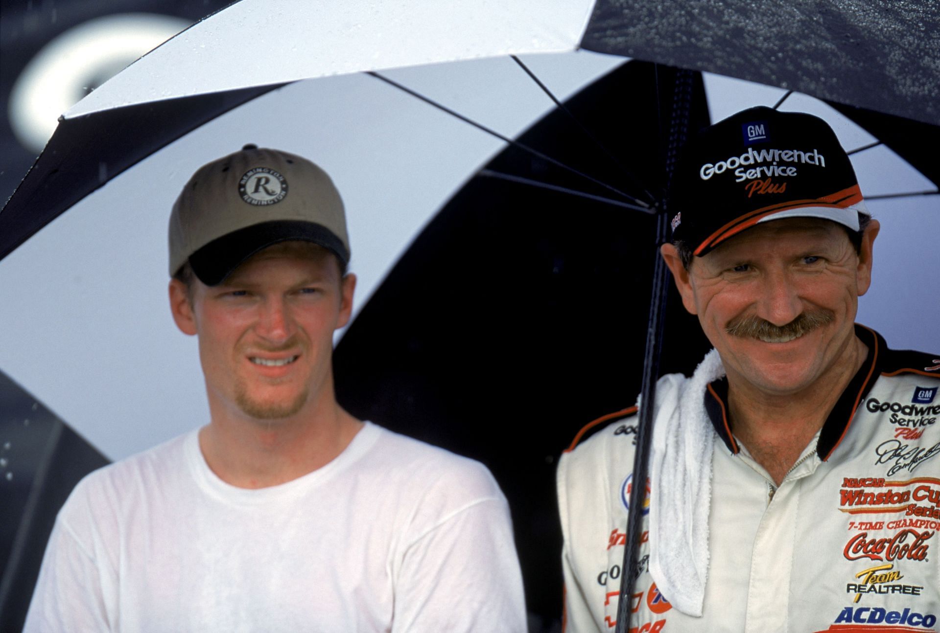 Earnhardts Jr. and Sr. pose for a photograph