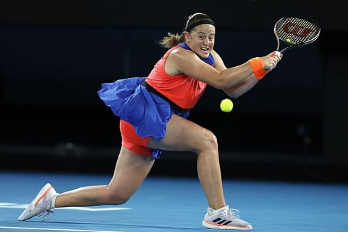 Jelena Ostapenko plays a backhand during the quarterfinal singles match against Elena Rybakina