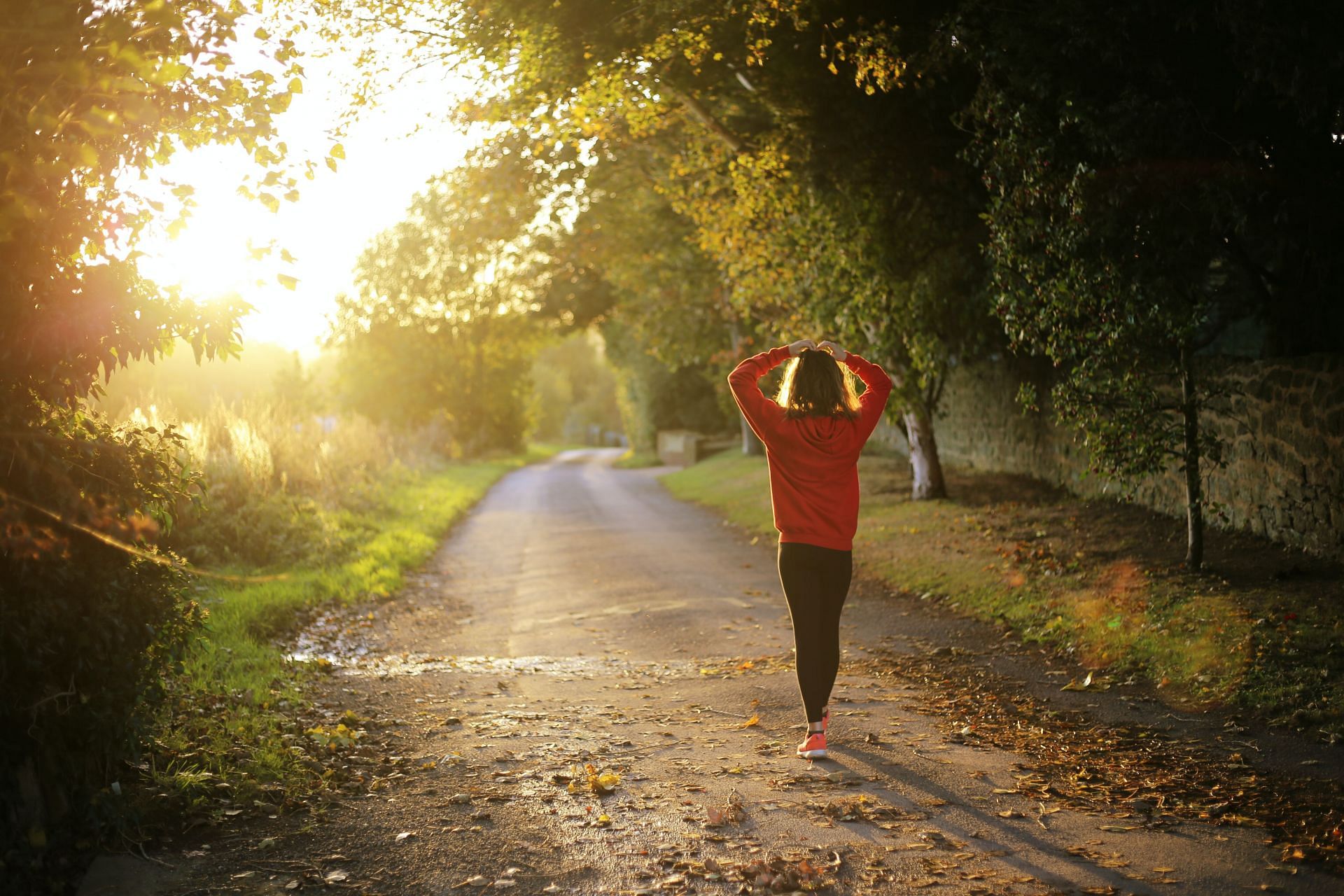 Walking helps in reducing stress levels. (Image via Unsplash/Emma Simpson)