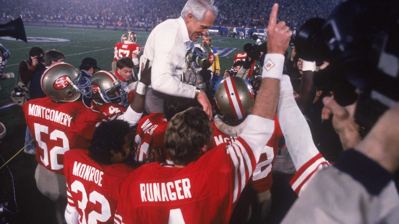 The 49ers hoist Bill Walsh up after winning Super Bowl XVI