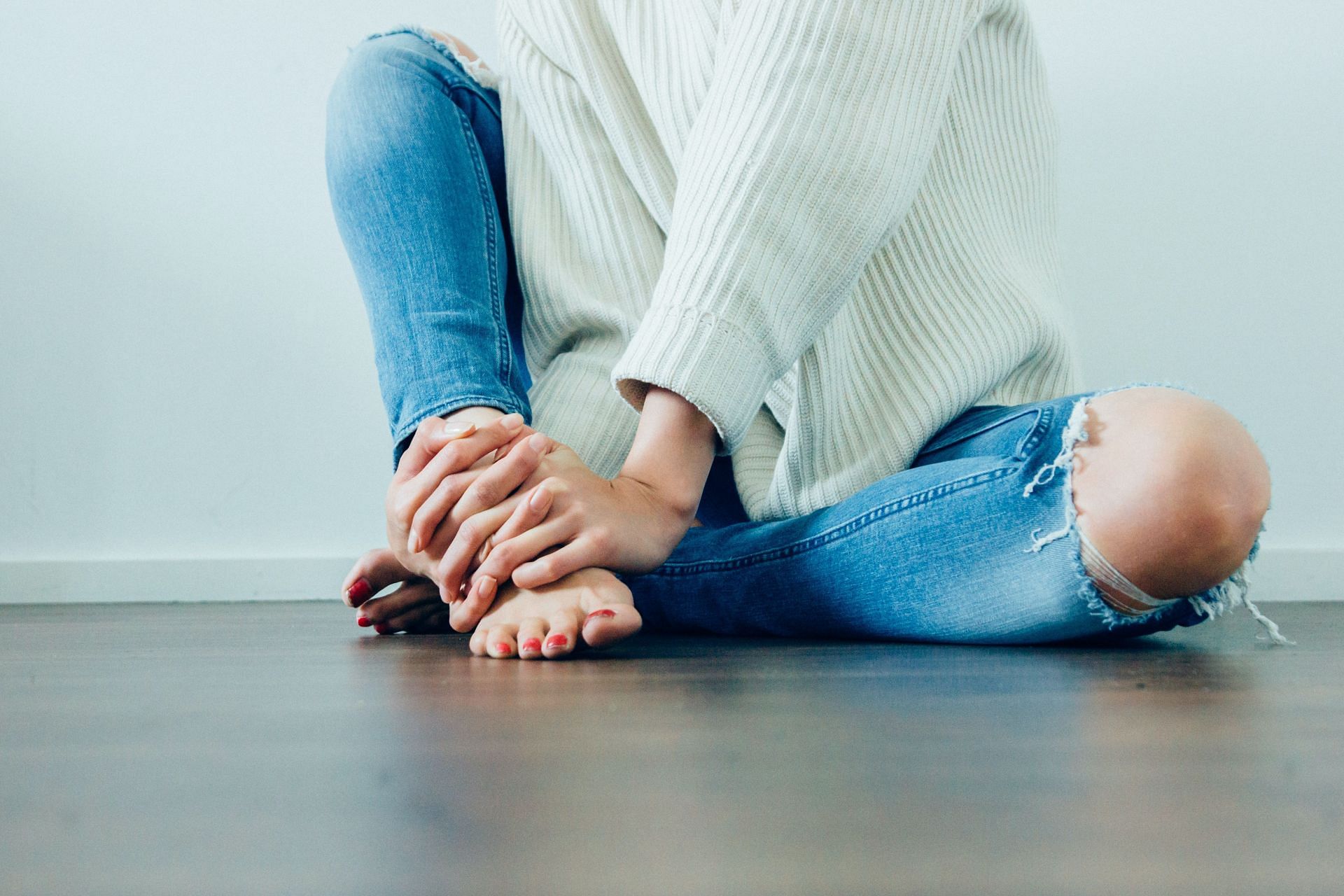 Foot pain can come from a variety of sources. (Image via Unsplash / Imani Bahati )