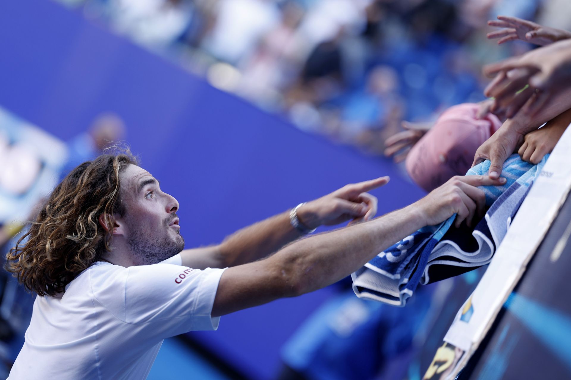 Stefanos Tsitsipas interacts with the crowd post his 2023 Australian Open semifinals win