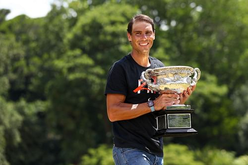 Rafael Nadal poses with the Norman Brookes Challenge Cup