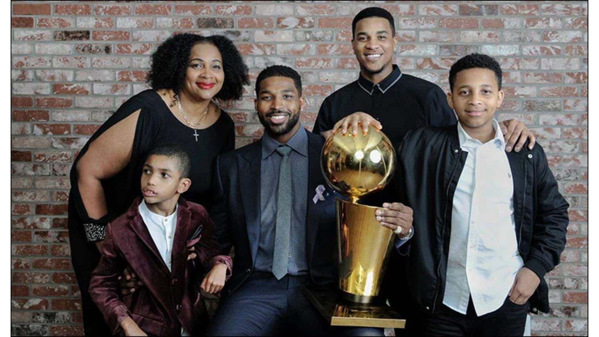 Andrea Thompson with her four sons. (Image via nba.com)