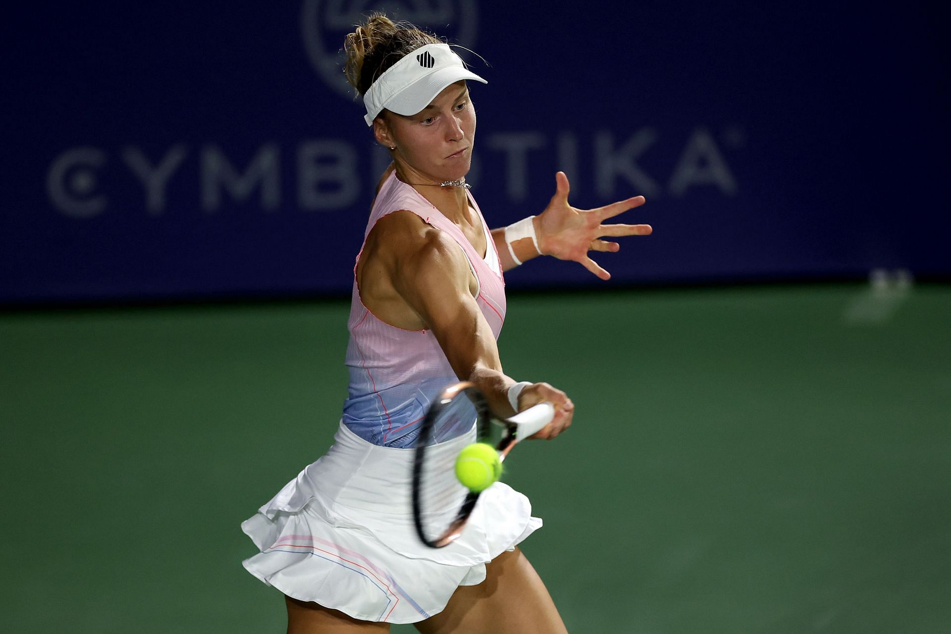 Samsonova strikes the ball at the San Diego Open