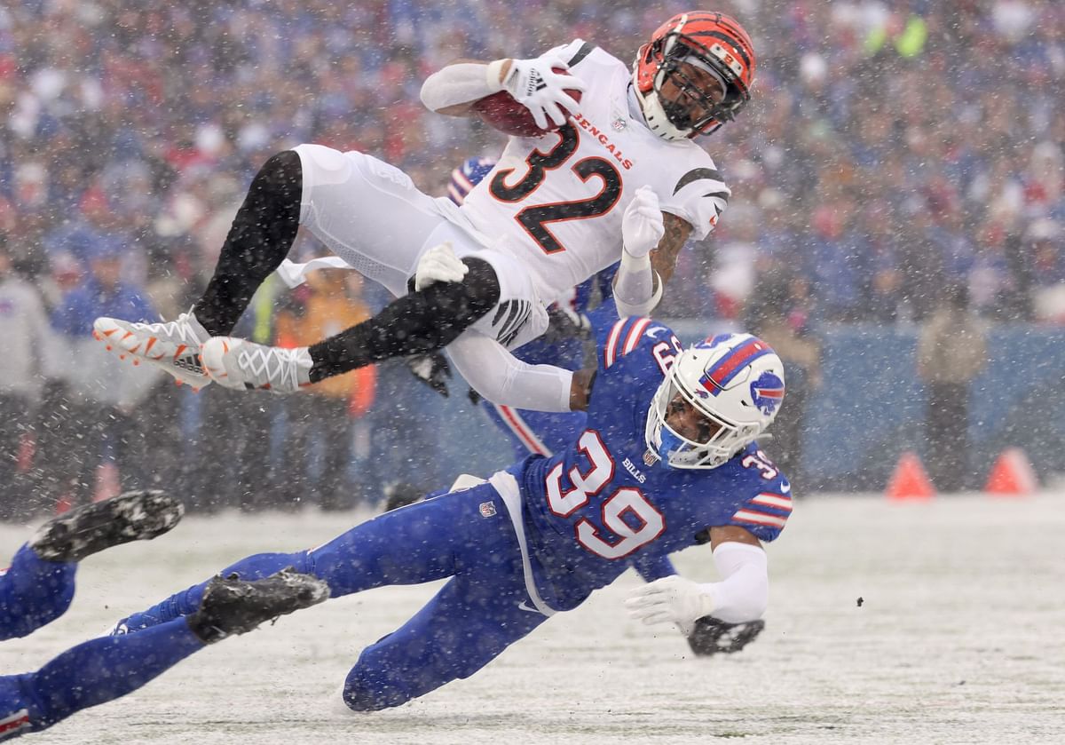 Josh Allen fights Bengals players while Damar Hamlin cheers on as Bills ...