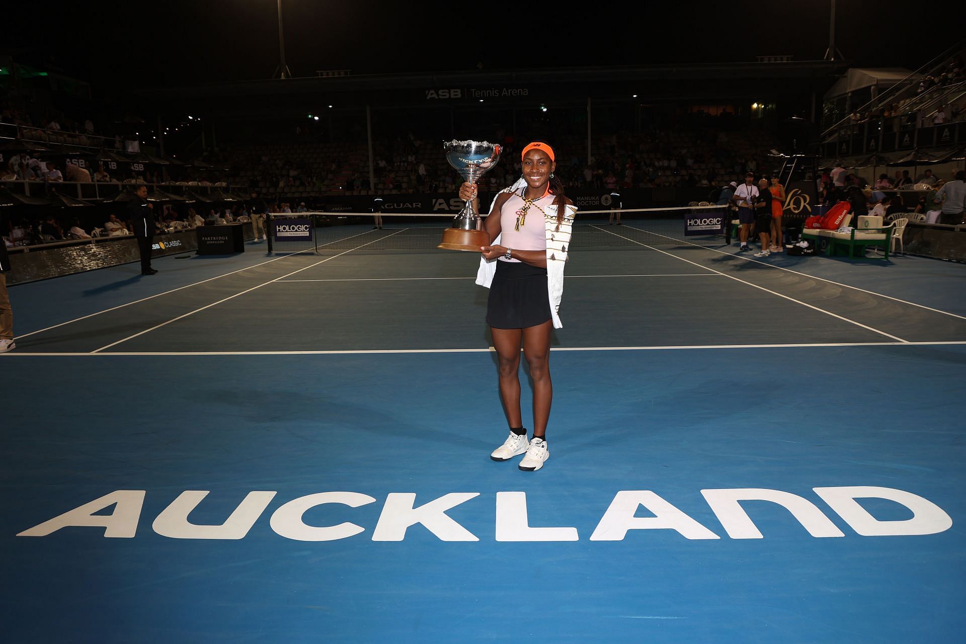 Coco Gauff posing with the trophy after winning the ASB Classic