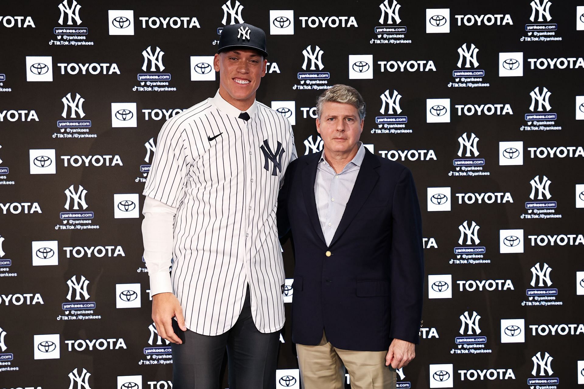 Aaron Judge Press Conference: BRONX, NEW YORK - DECEMBER 21: Aaron Judge (99) of the New York Yankees poses for a photo with Yankees principal owner Hal Steinbrenner after a press conference at Yankee Stadium on December 21, 2022, in Bronx, New York. (Photo by Dustin Satloff/Getty Images)